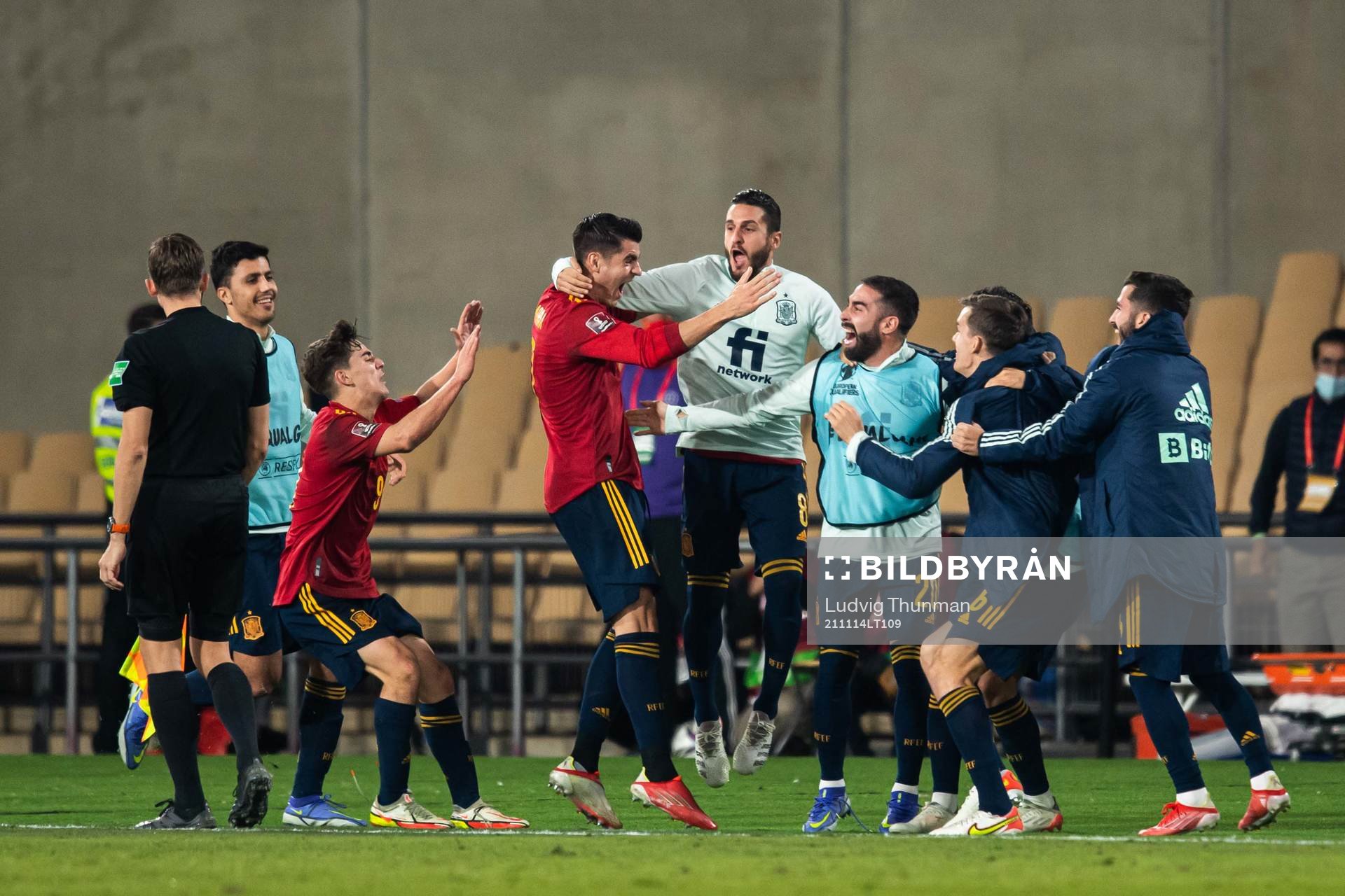 Alvaro Morata of Spain celebrate with teammates after scoring the 1-0 goal during the FIFA World Cup Qualifier football match between Spain and Sweden on November 14, 2021 in Seville.