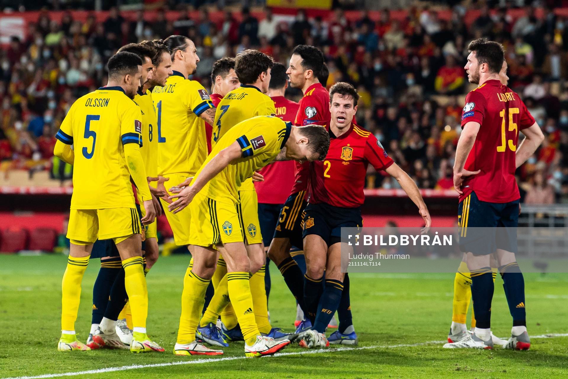 Zlatan Ibrahimovic of Sweden and Sergio Busquets of Spain