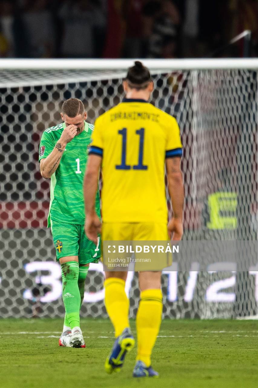 Zlatan Ibrahimovic and goalkeeper Robin Olsen of Sweden
