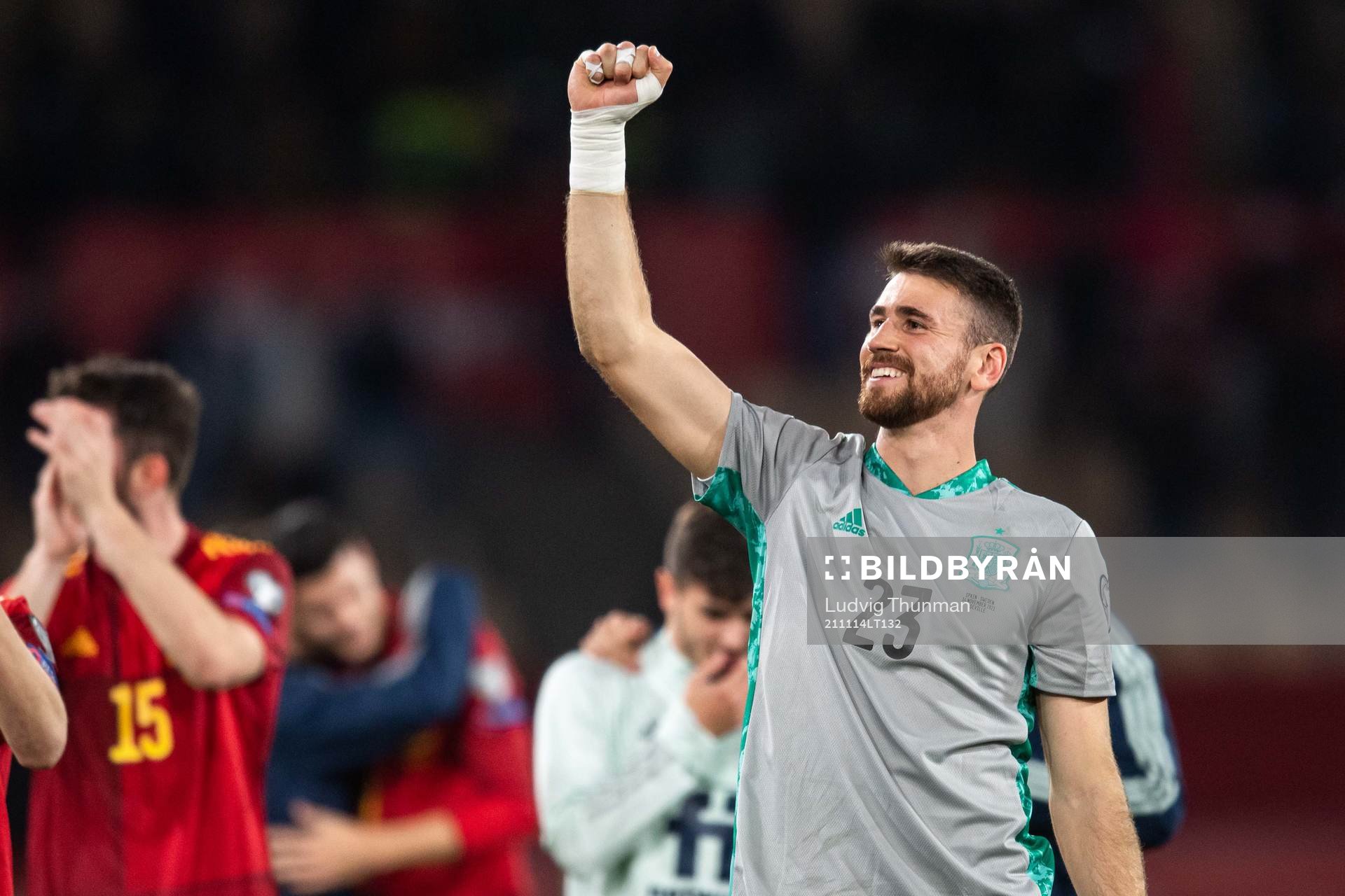 goalkeeper Unai Simon of Spain celebrates