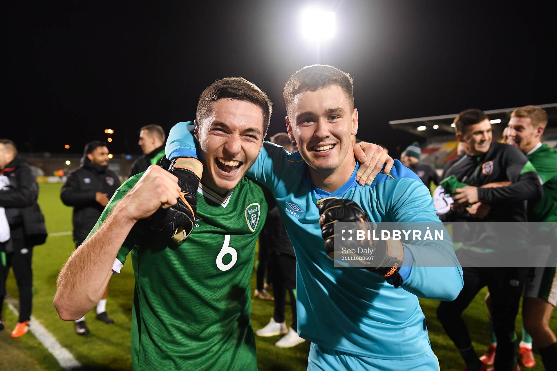 Conor Coventry and Louie Watson of Republic of Ireland celebrate after the UEFA European Under-21 Qualifier football match between Ireland and Sweden on November 16, 2021 in Dublin.
