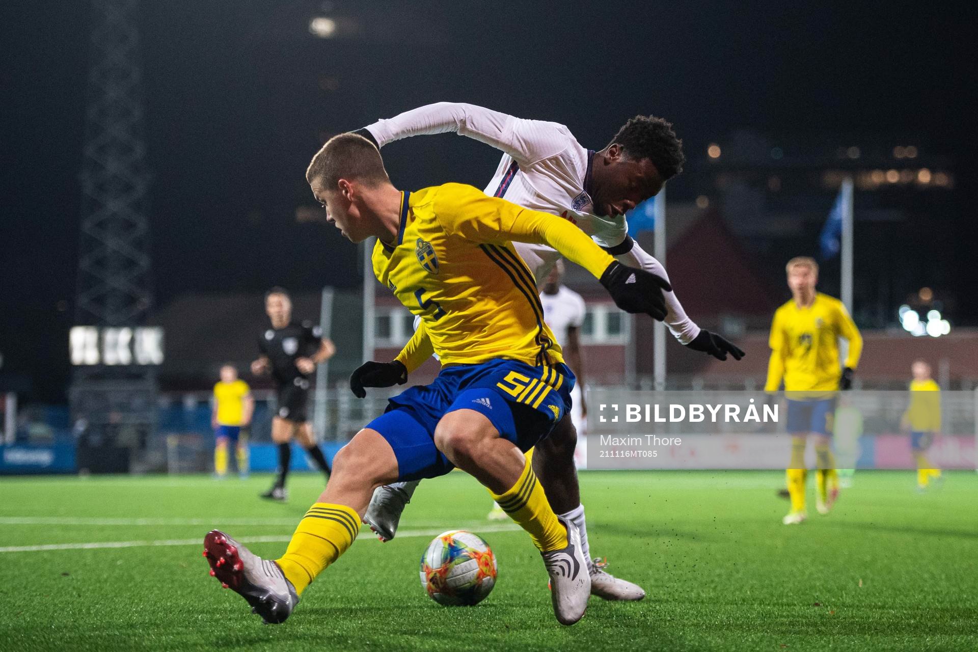 Samuel Dahl of Sweden and Nile John of England during the UEFA European U18 Qualifier football match between Sweden and England on November 16, 2021 in Stockholm. 