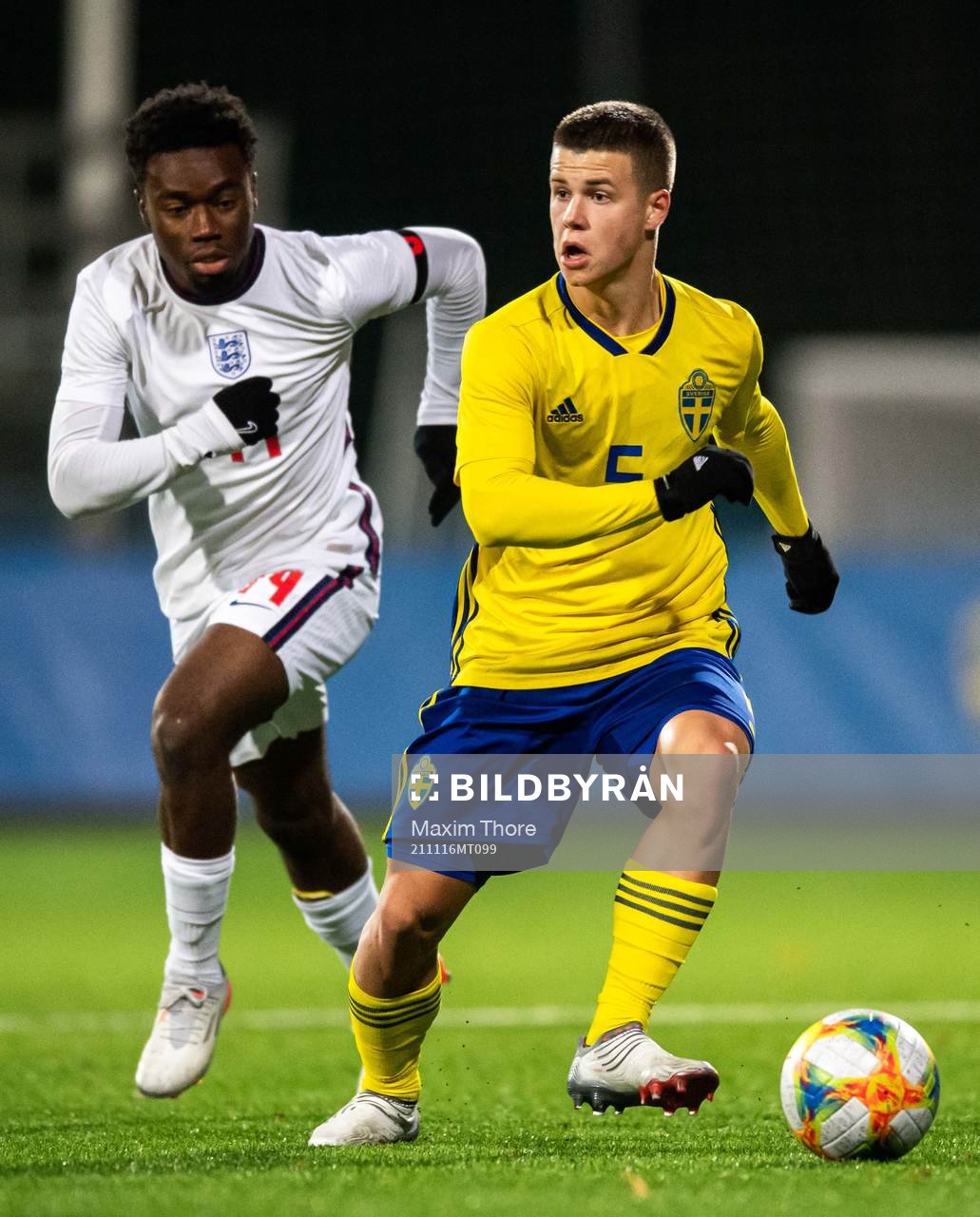 Nile John of England and Samuel Dahl of Sweden during the UEFA European U18 Qualifier football match between Sweden and England on November 16, 2021 in Stockholm.