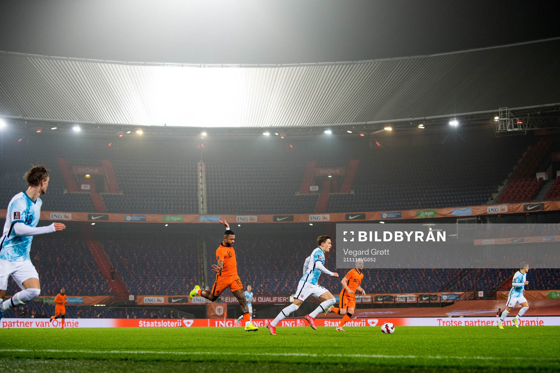 Memphis Depay of Netherlands and Marcus Holmgren Pedersen