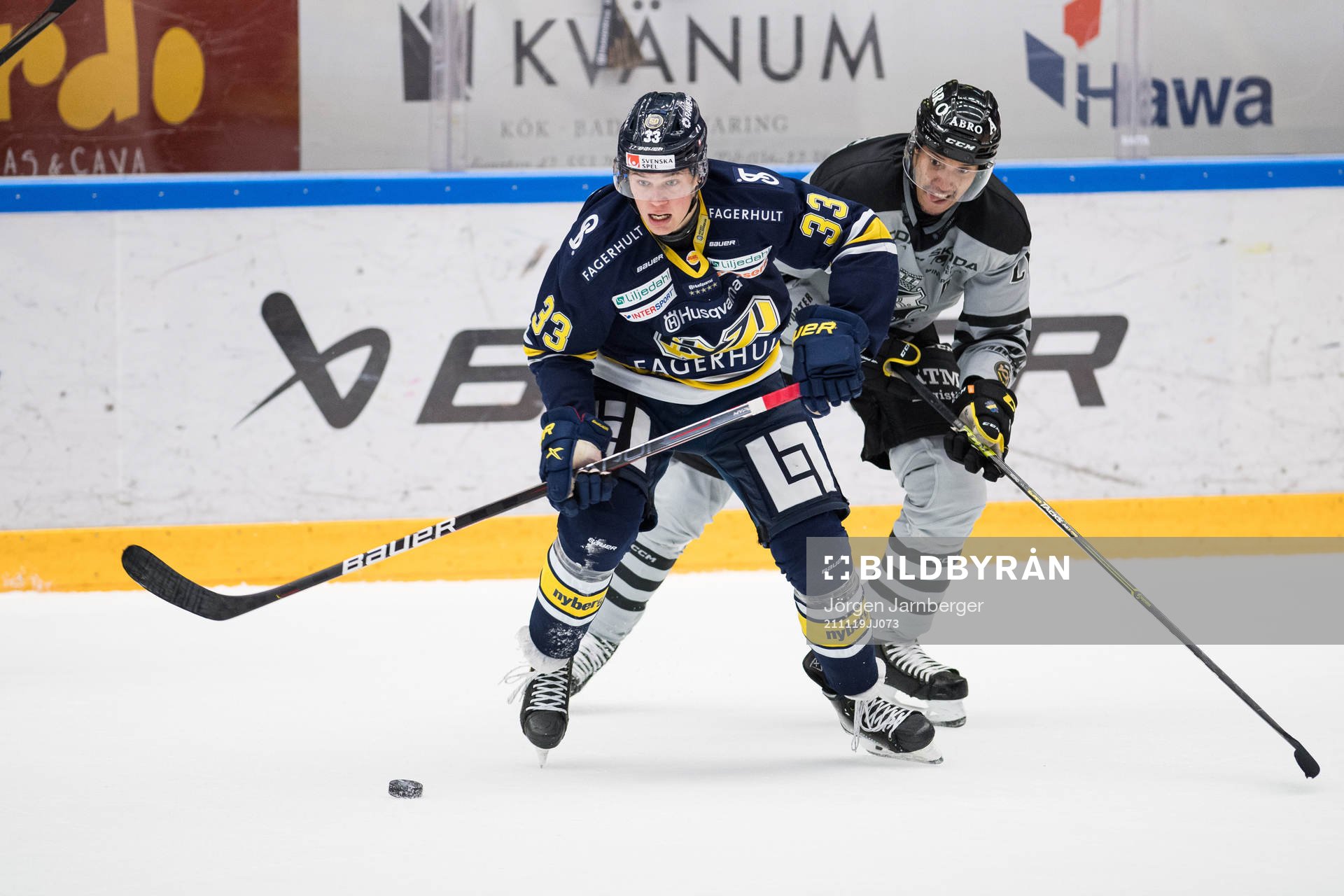 s Måns Lindbäck och AIK:s Fredric Weigel