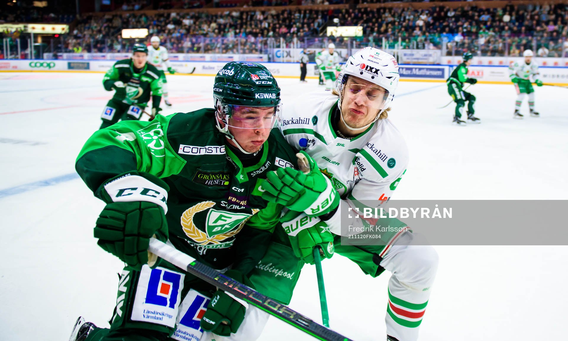 Färjestads Oscar Lawner och Rögles Tony Sund