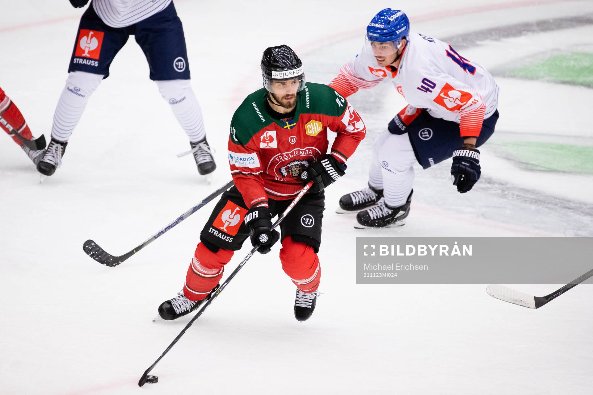 Michael Spacek of Frölunda and Valentino Klos of Adler