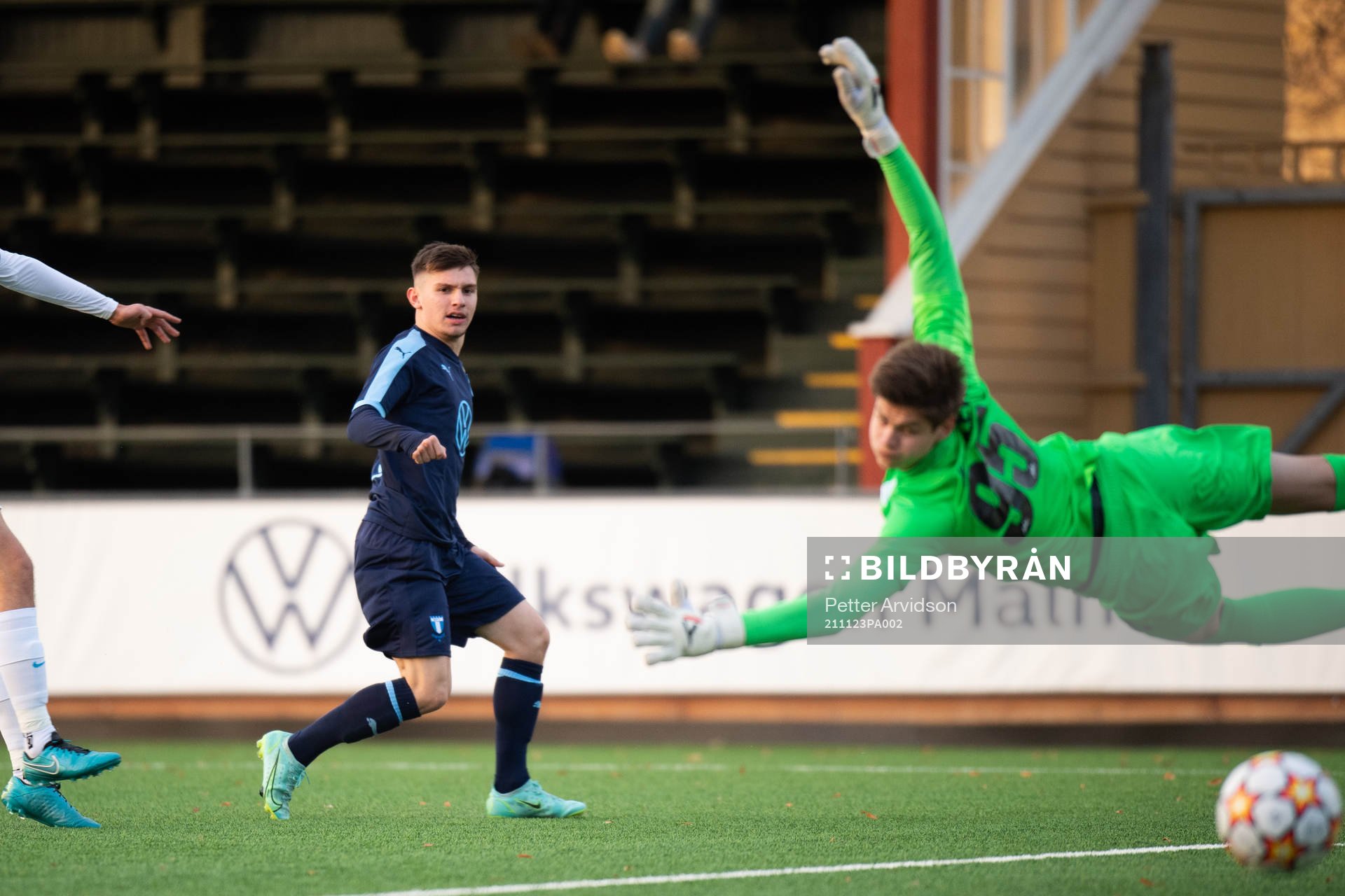 Isak Bjerkebo of Malmö FF and goalkeeper Georgii Korolev