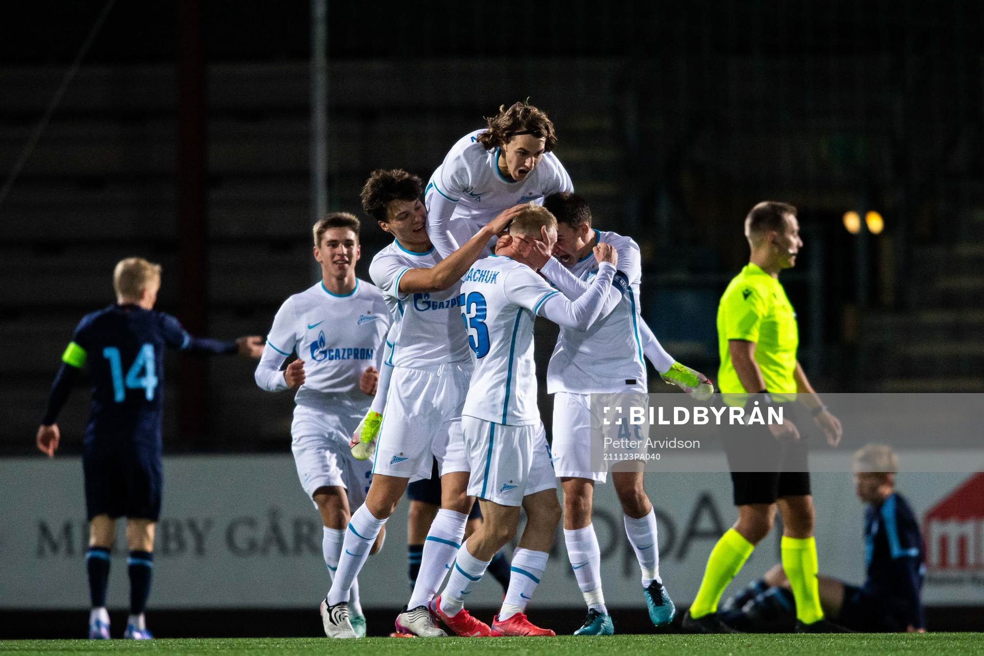 Dmitrii Vasilev of Zenit celebrate with teammates