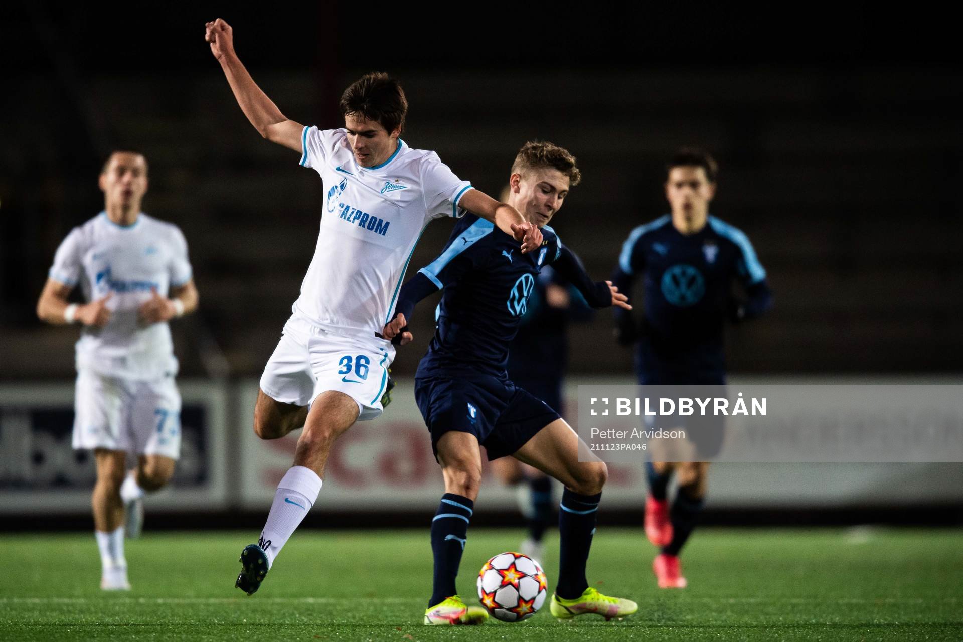 Dmitrii Bykov of Zenit and Hugo Bolin of Malmö FF during the UEFA Youth League match between Malmö FF and Zenit St Petersburg on November 23, 2021 in Malmö. 