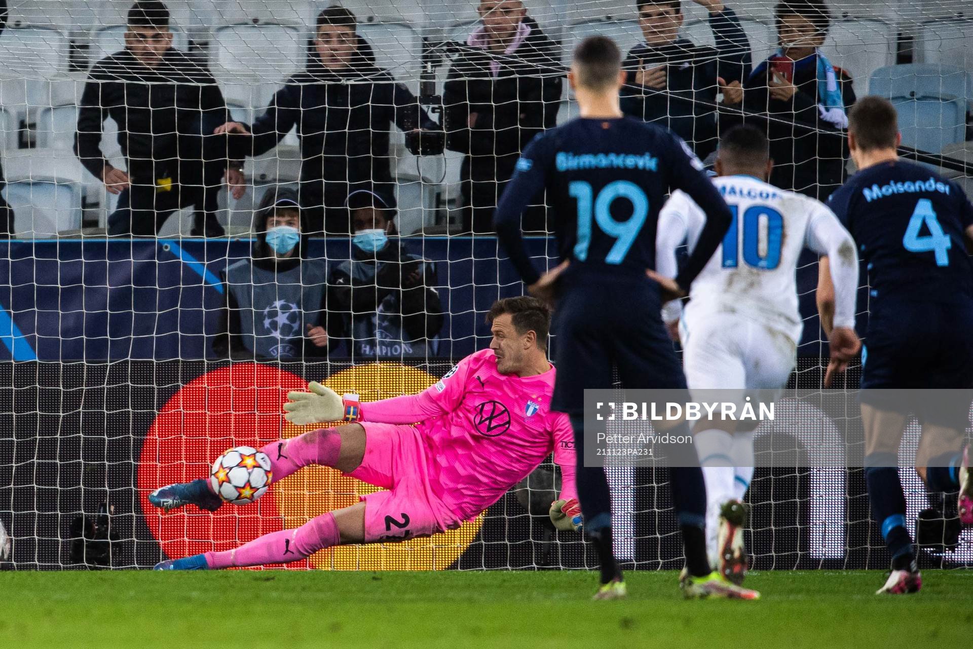 Goalkeeper Johan Dahlin of Malmö FF saves a penalty from