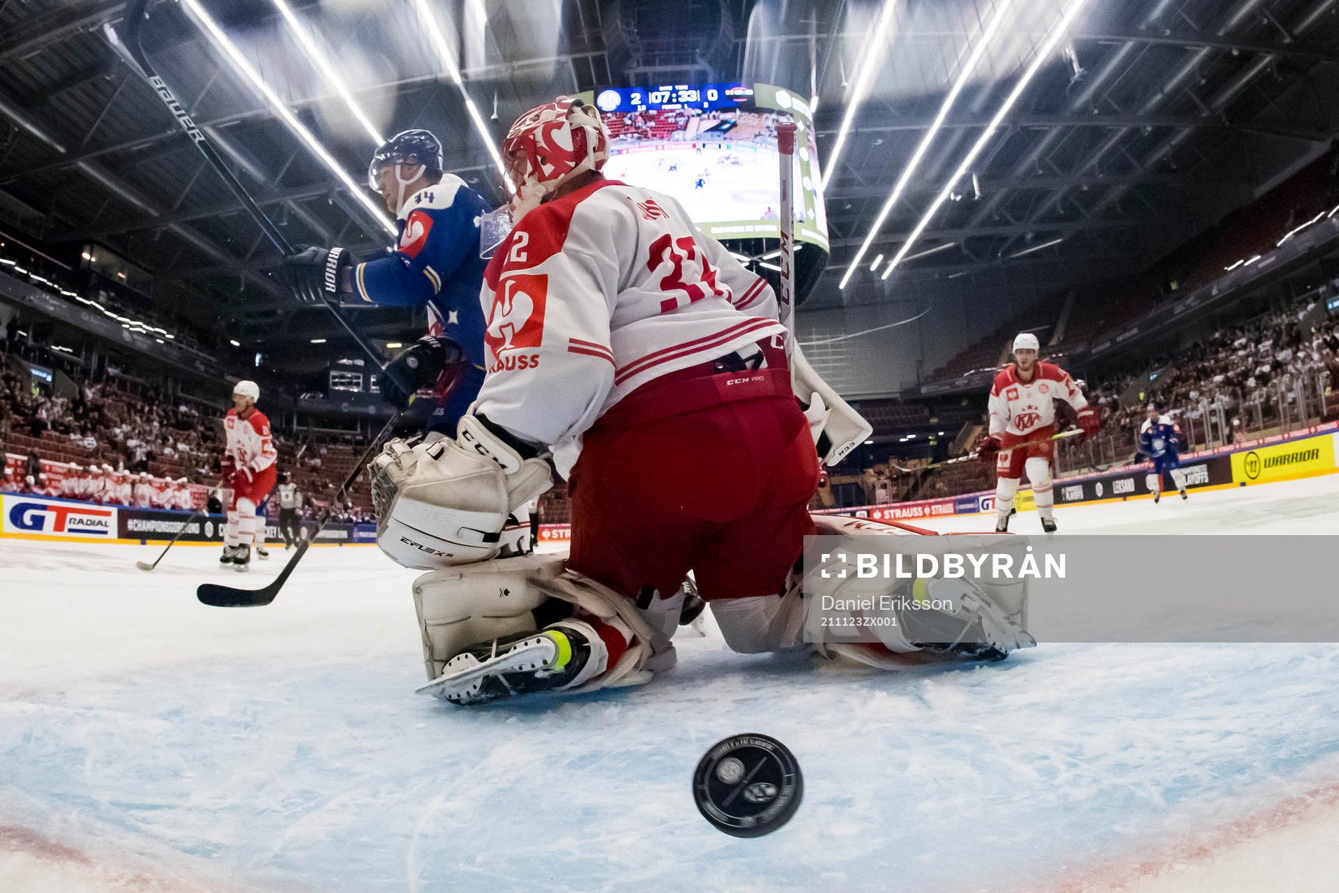 Leksands Carter Ashton and Klagenfurts goaltender Sebastian