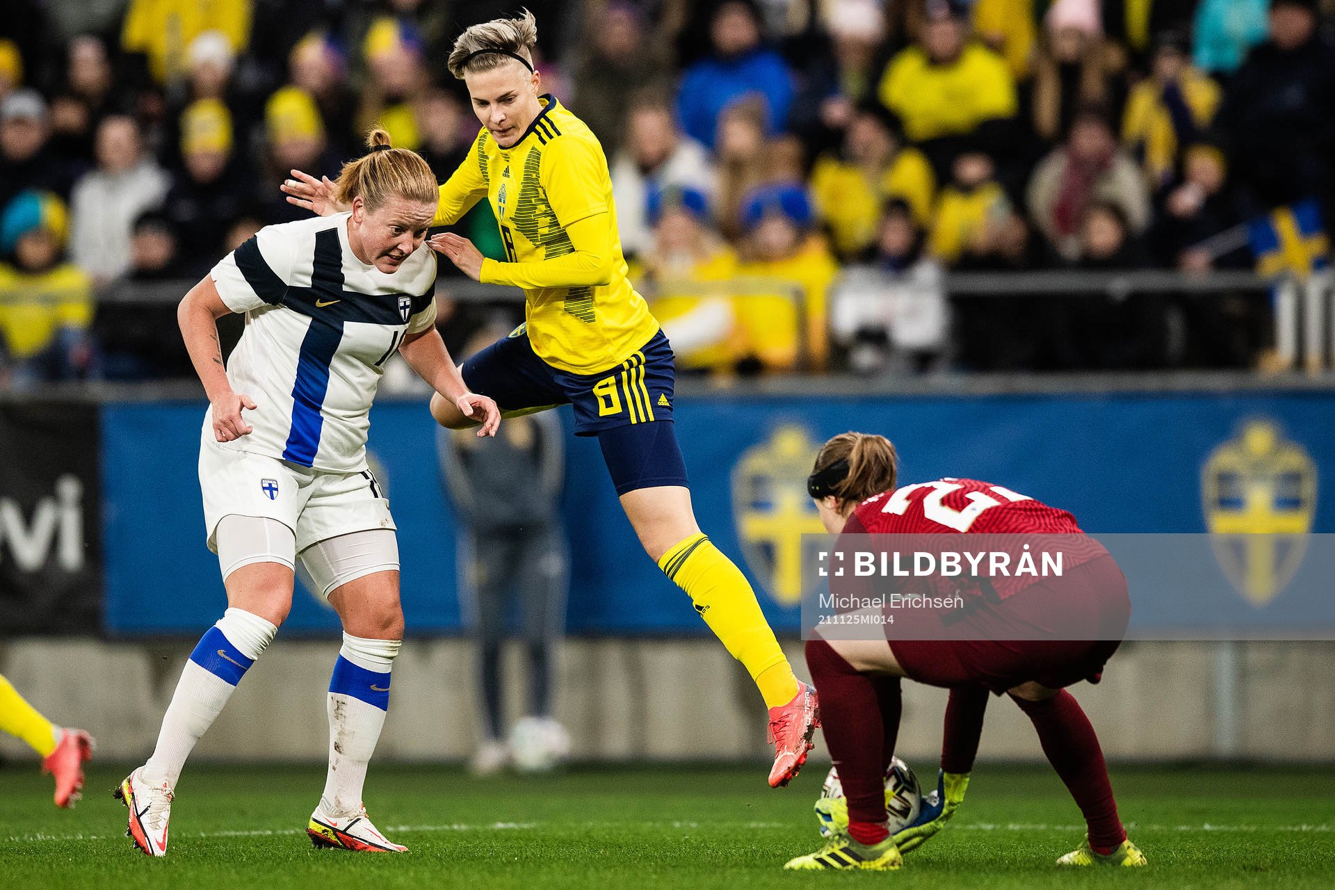 Anna Westerlund and goalkeeper Tinja-Riikka Korpela of