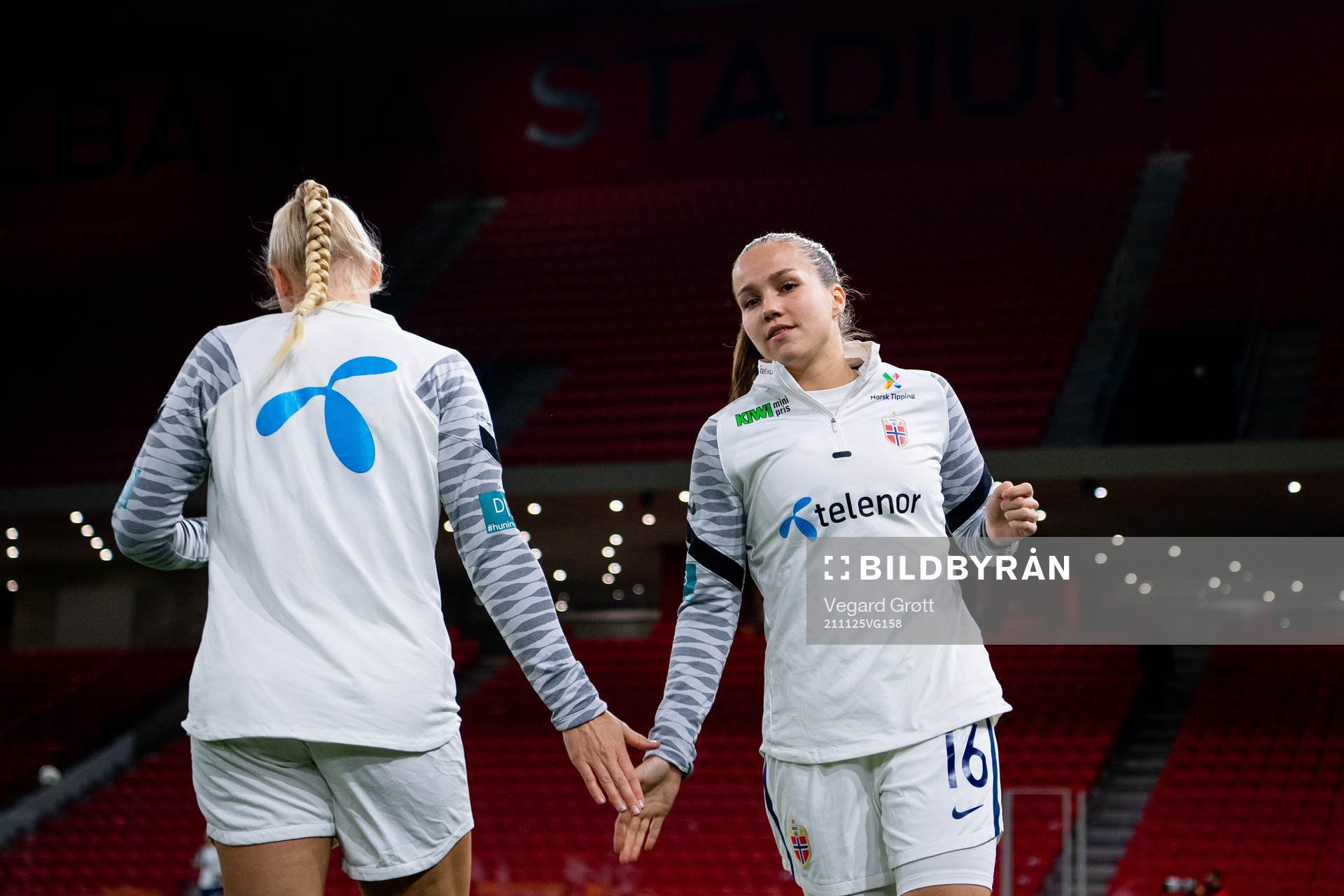 Maria Thorisdottir and Guro Reiten of Norway warm up