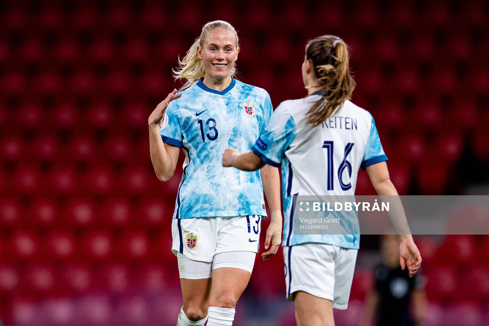 Guro Reiten of Norway celebrates with teammate Guro