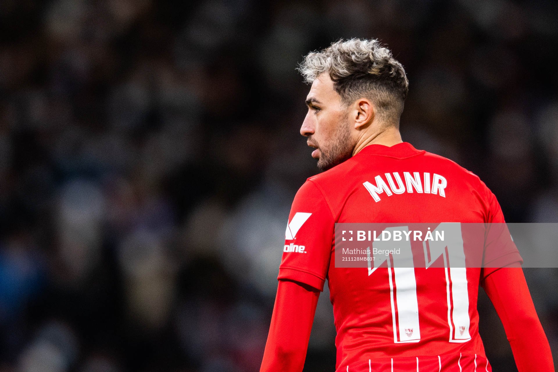 Munir El Haddadi of Sevilla looks dejected