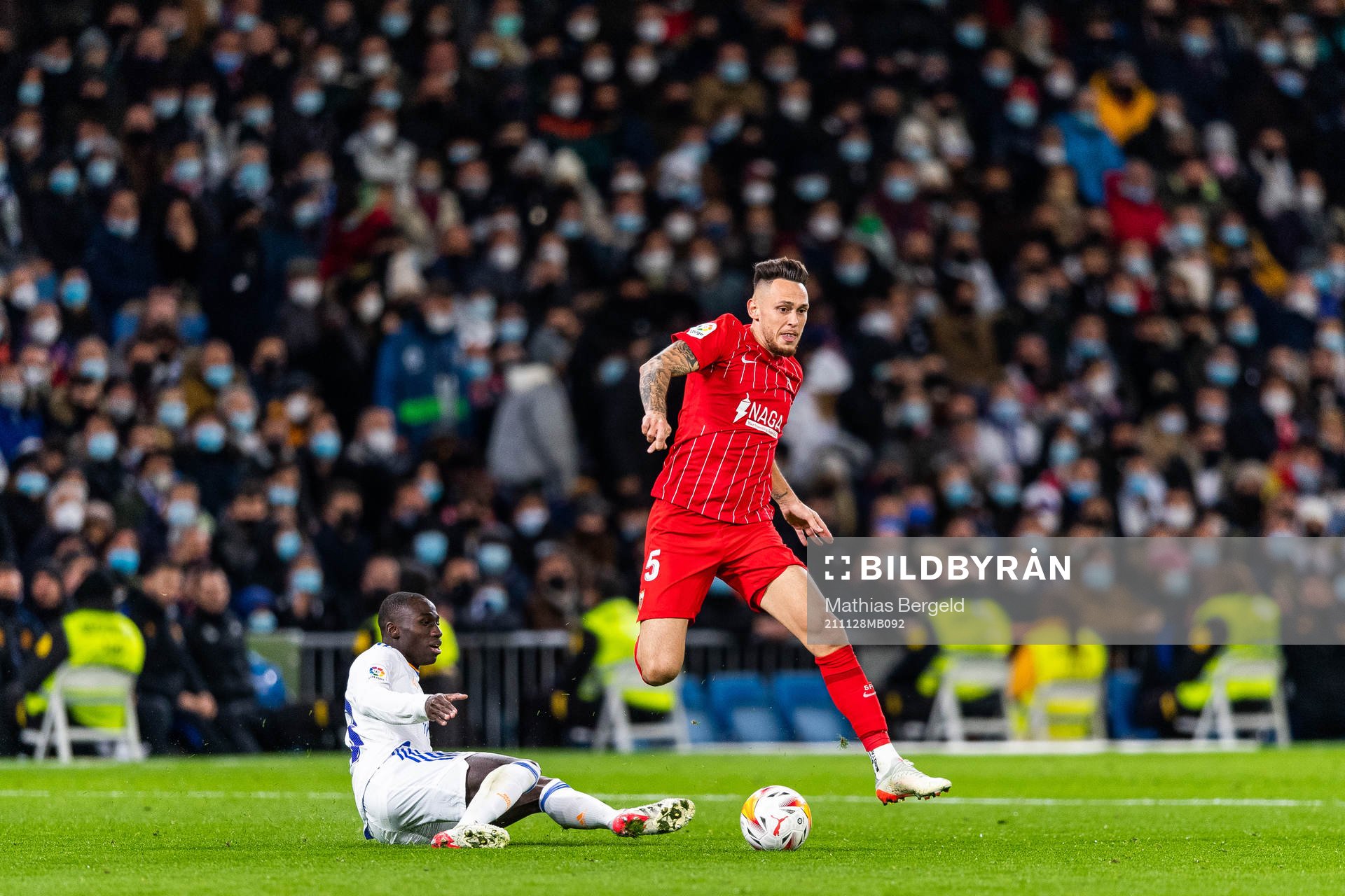 Ferland Mendy of Real Madrid and Lucas Ocampos of Sevilla