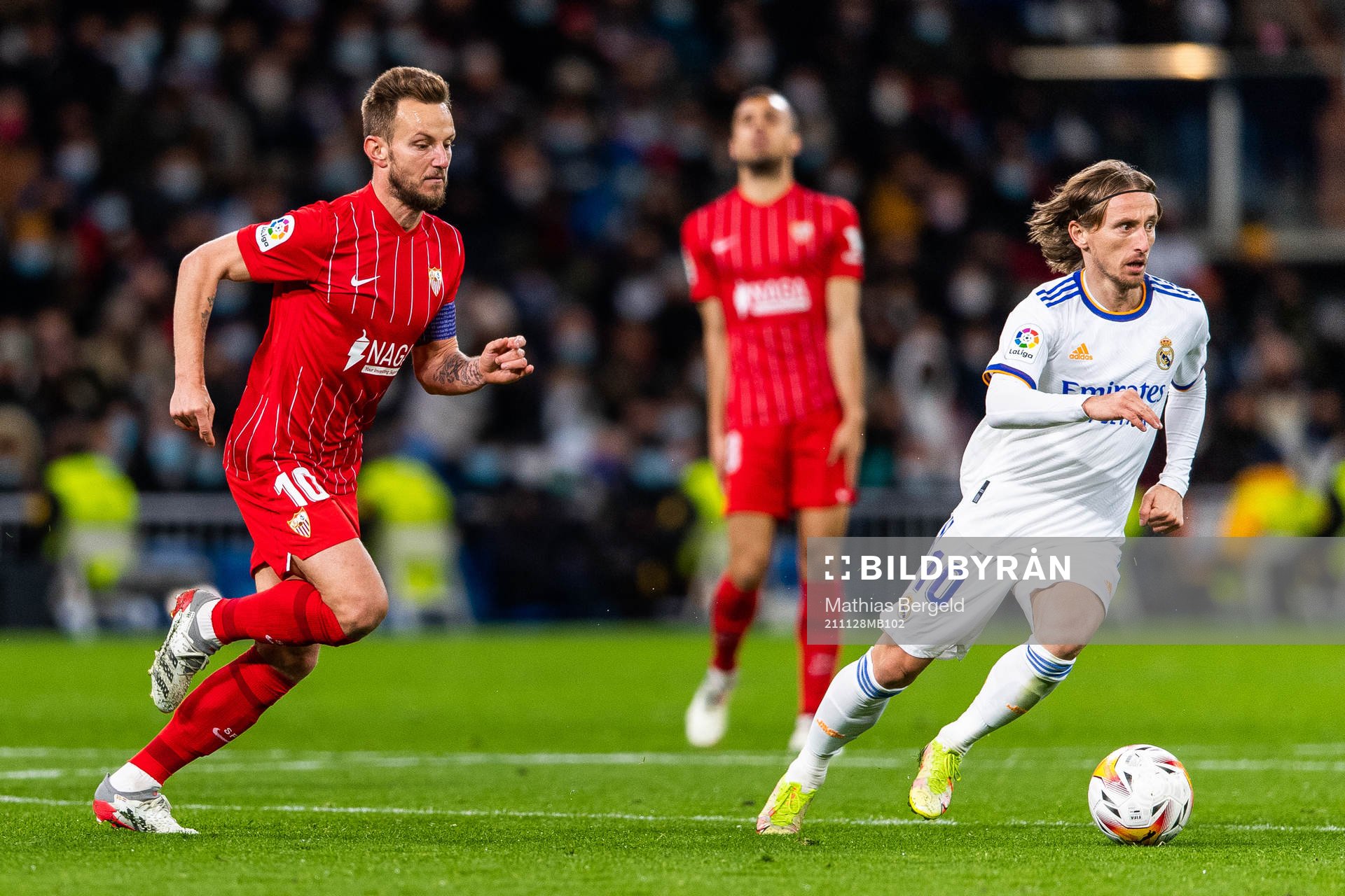 Ivan Rakitic of Sevilla and Luka Modric of Real Madrid