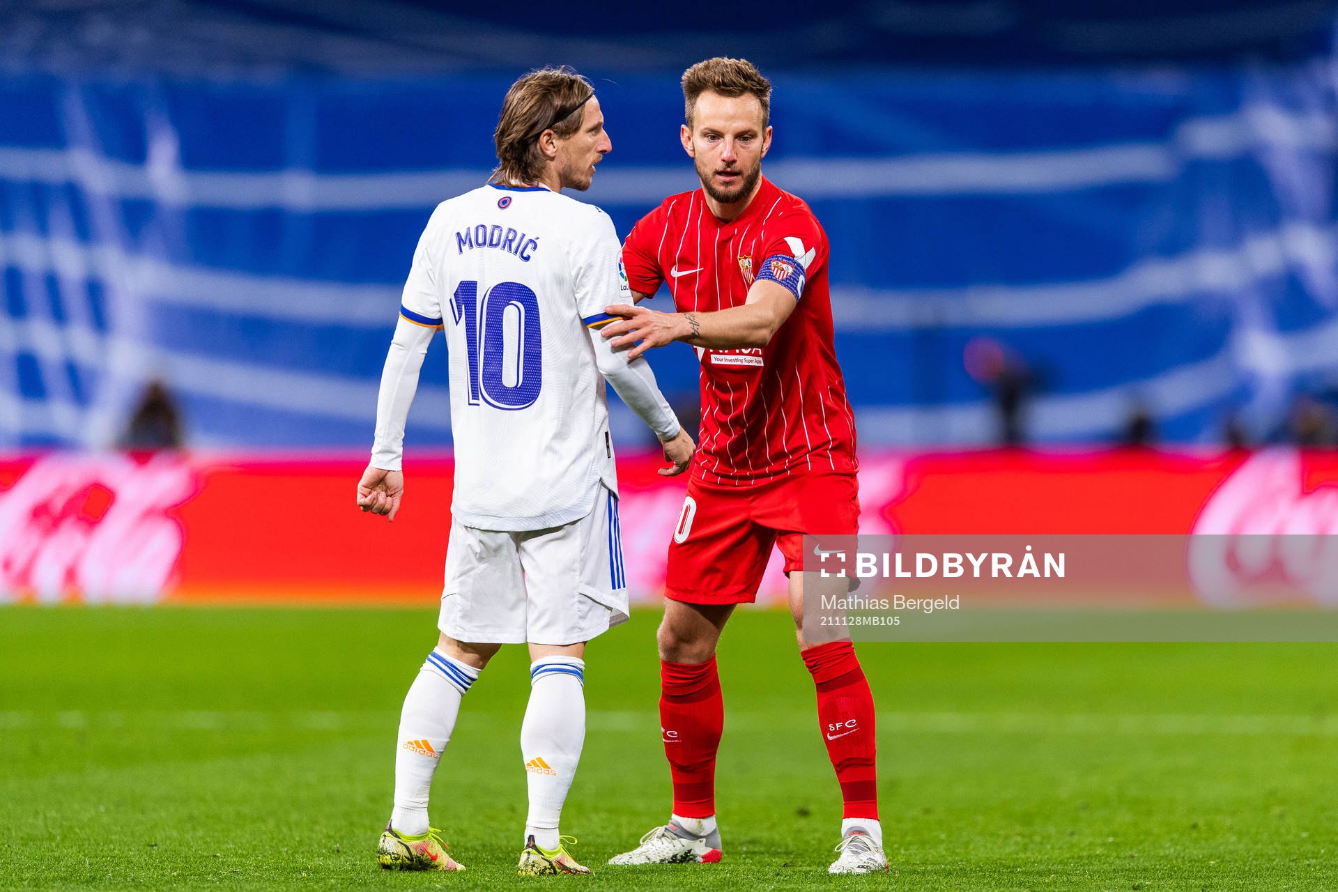 Luka Modric of Real Madrid and Ivan Rakitic of Sevilla