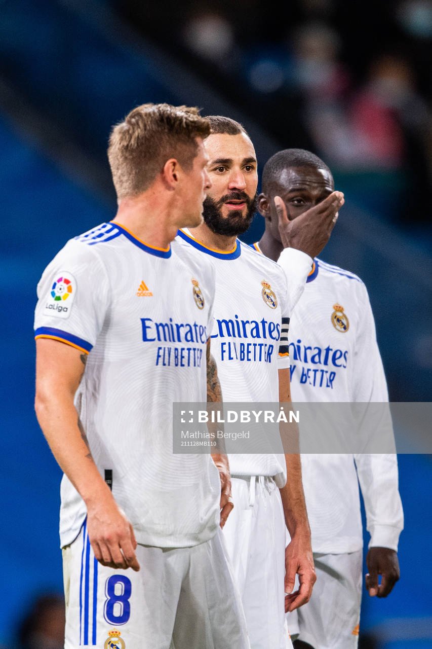 Toni Kroos, Karim Benzema and Ferland Mendy of Real Madrid