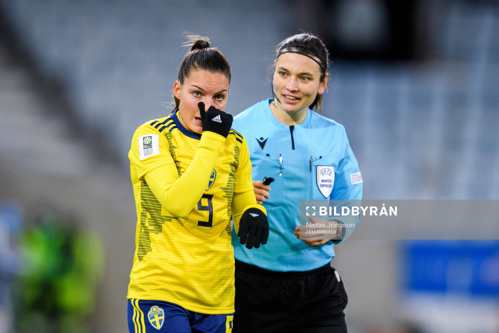 Johanna Rytting Kaneryd of Sweden and referee Angelika