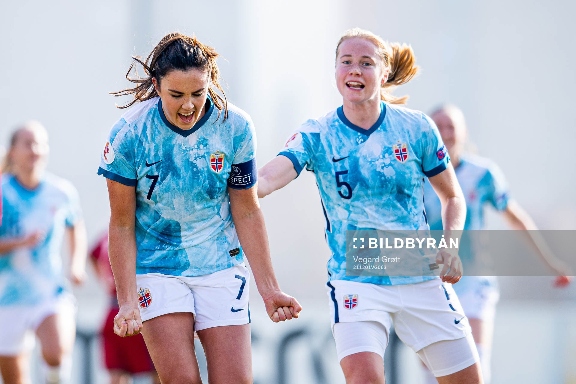 Ingrid Syrstad Engen of Norway celebrates with teammate