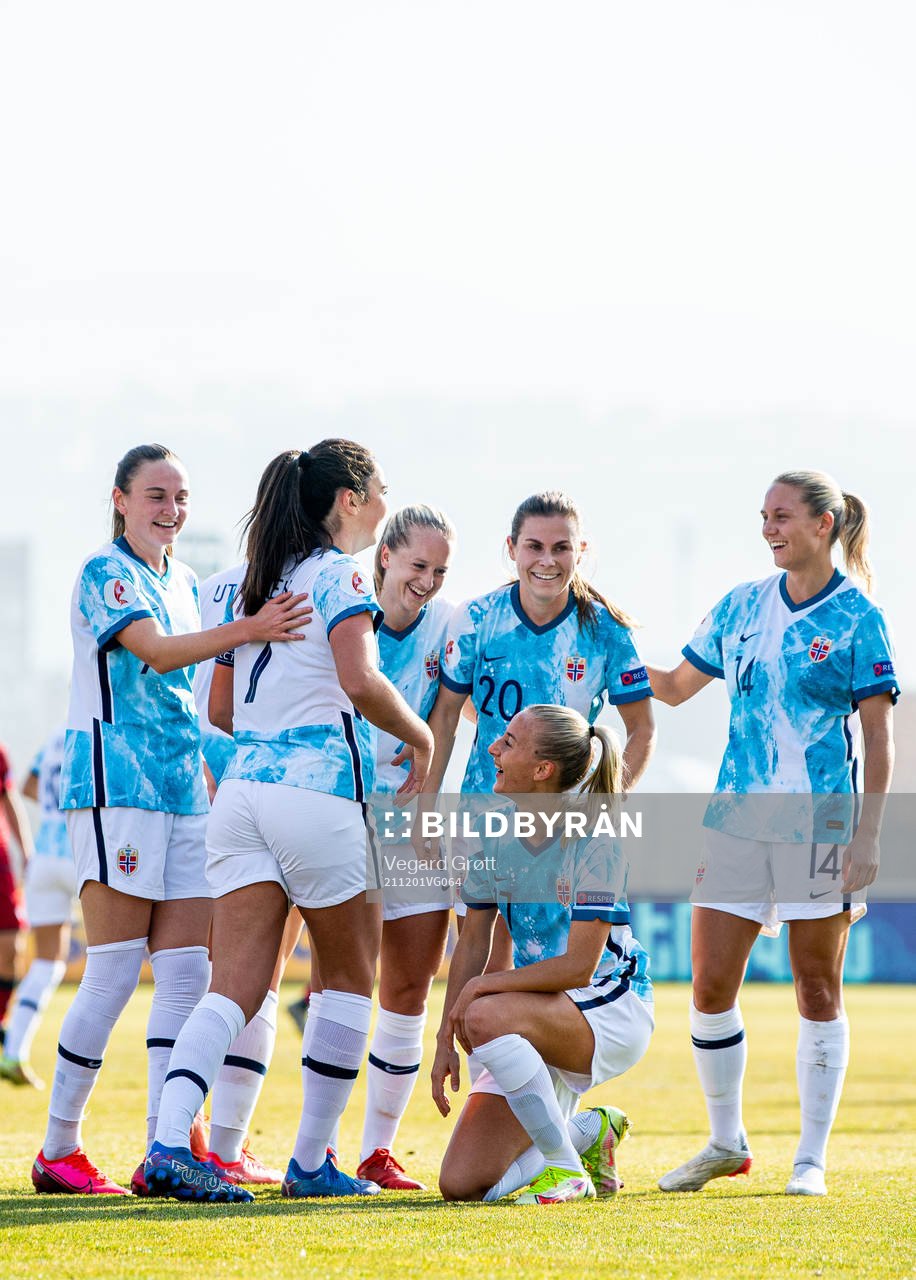Ingrid Syrstad Engen of Norway celebrates with teammates