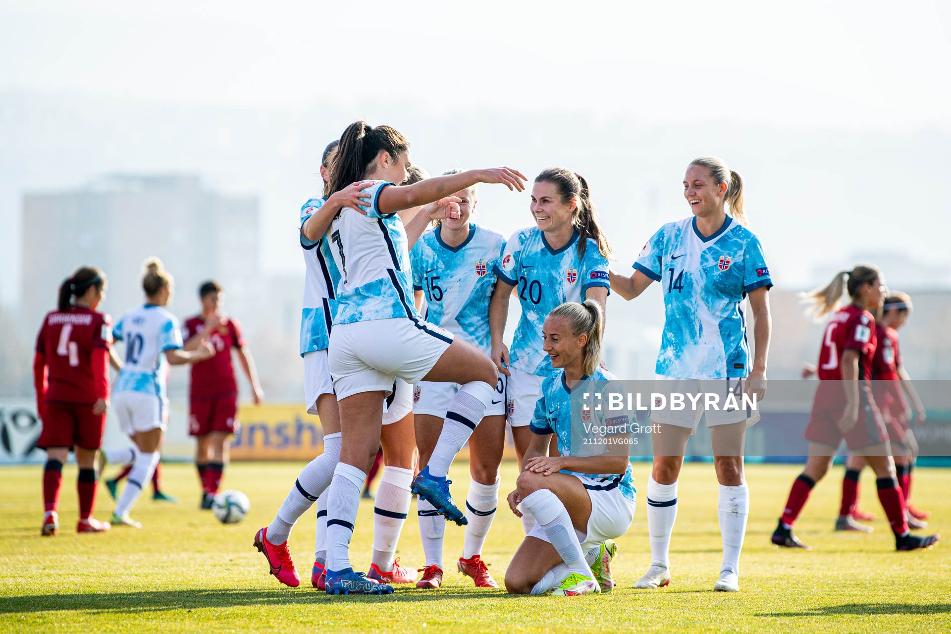 Ingrid Syrstad Engen of Norway celebrates with teammates