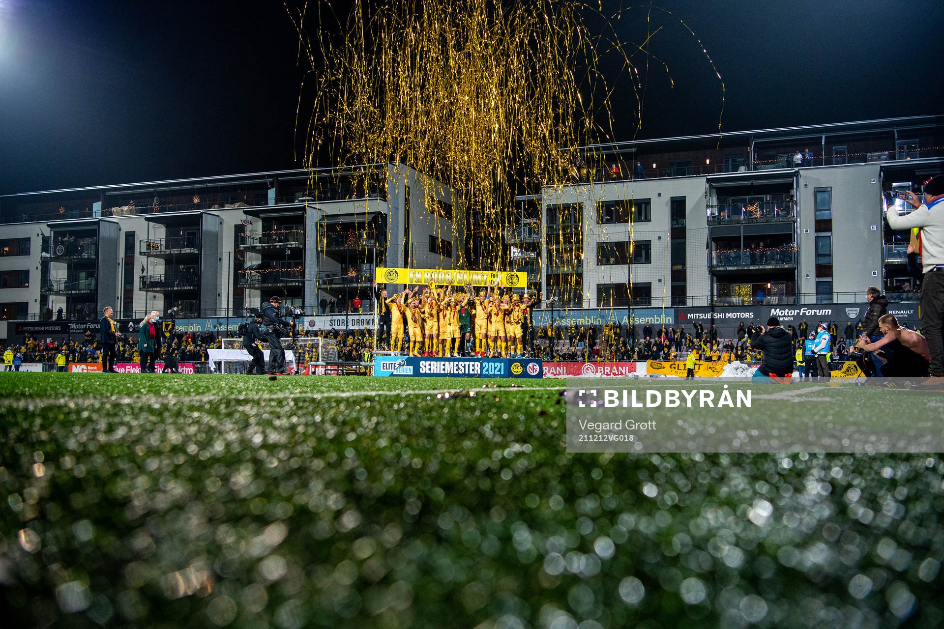 Players and staff of Bodø/Glimt celebrate with the trophy