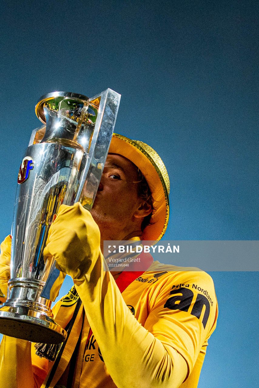 Ola Solbakken of Bodø/Glimt kisses the trophy winning the