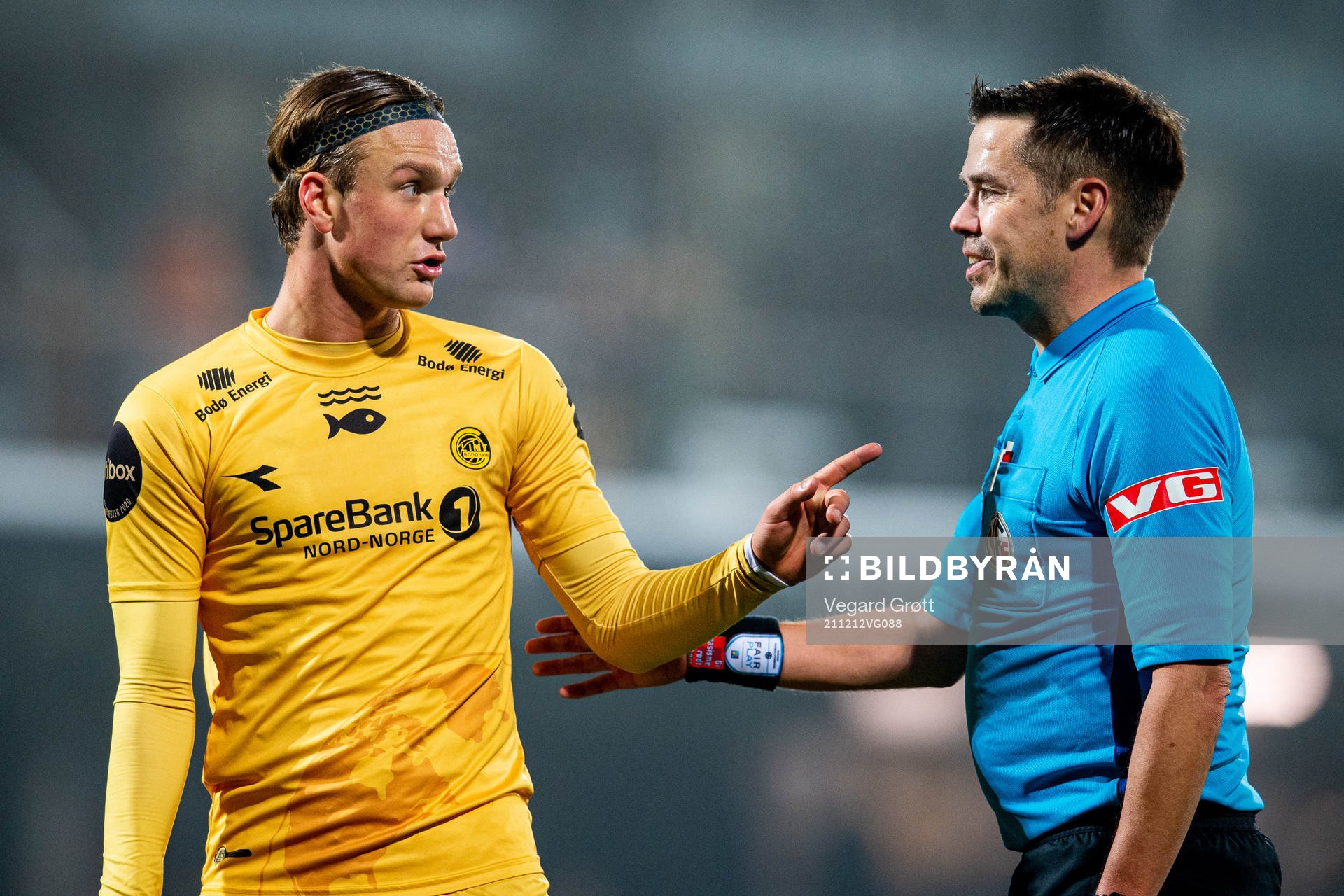 Erik Botheim of Bodø/Glimt talks to referee Tom Harald