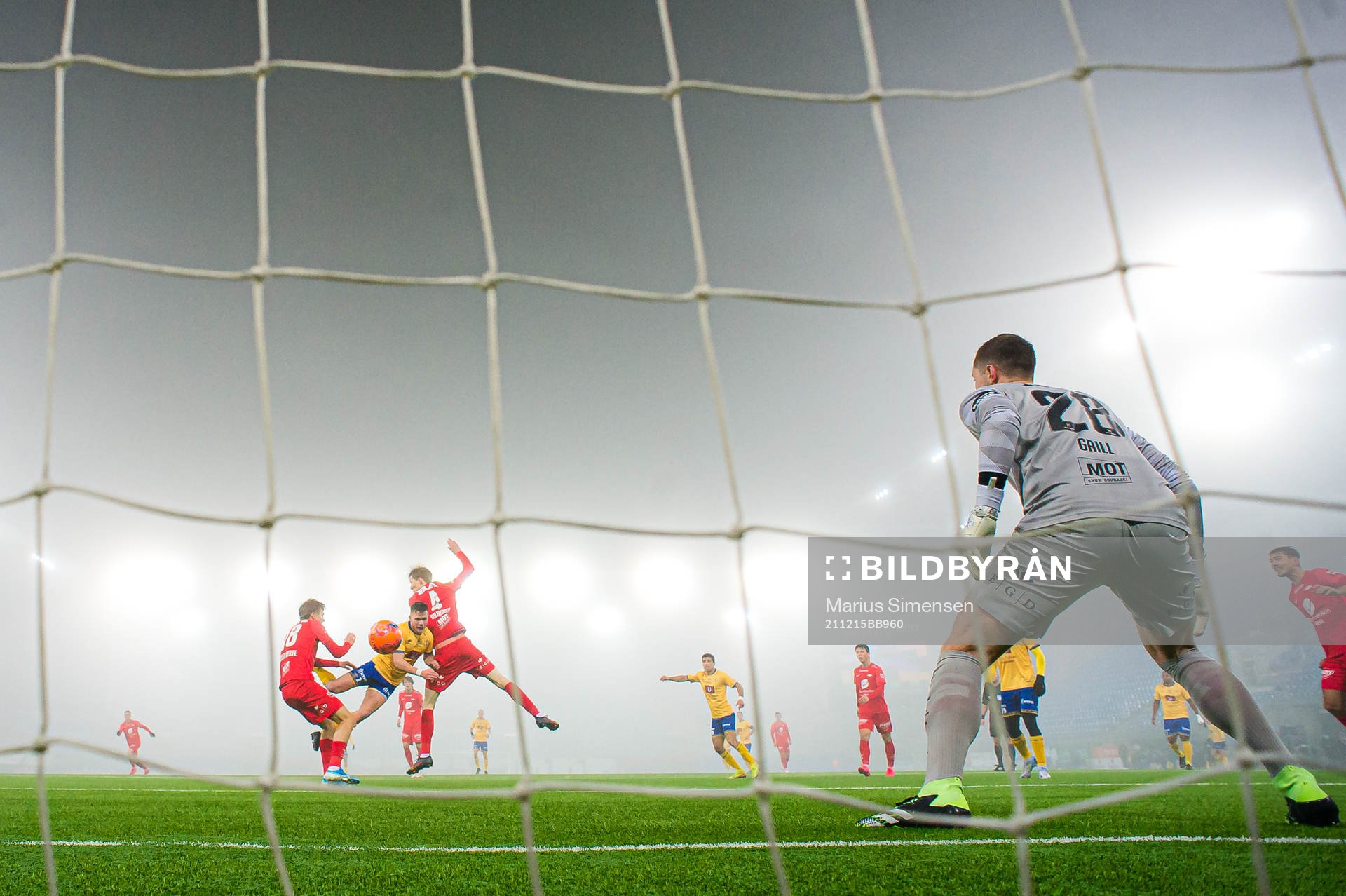 Torje Wichne of Jerv scores the 0-1 goal behind Hannes Lennart Grill of Brann during the Eliteserien playoff football match between Brann and Jerv on December 15, 2021 in Oslo.