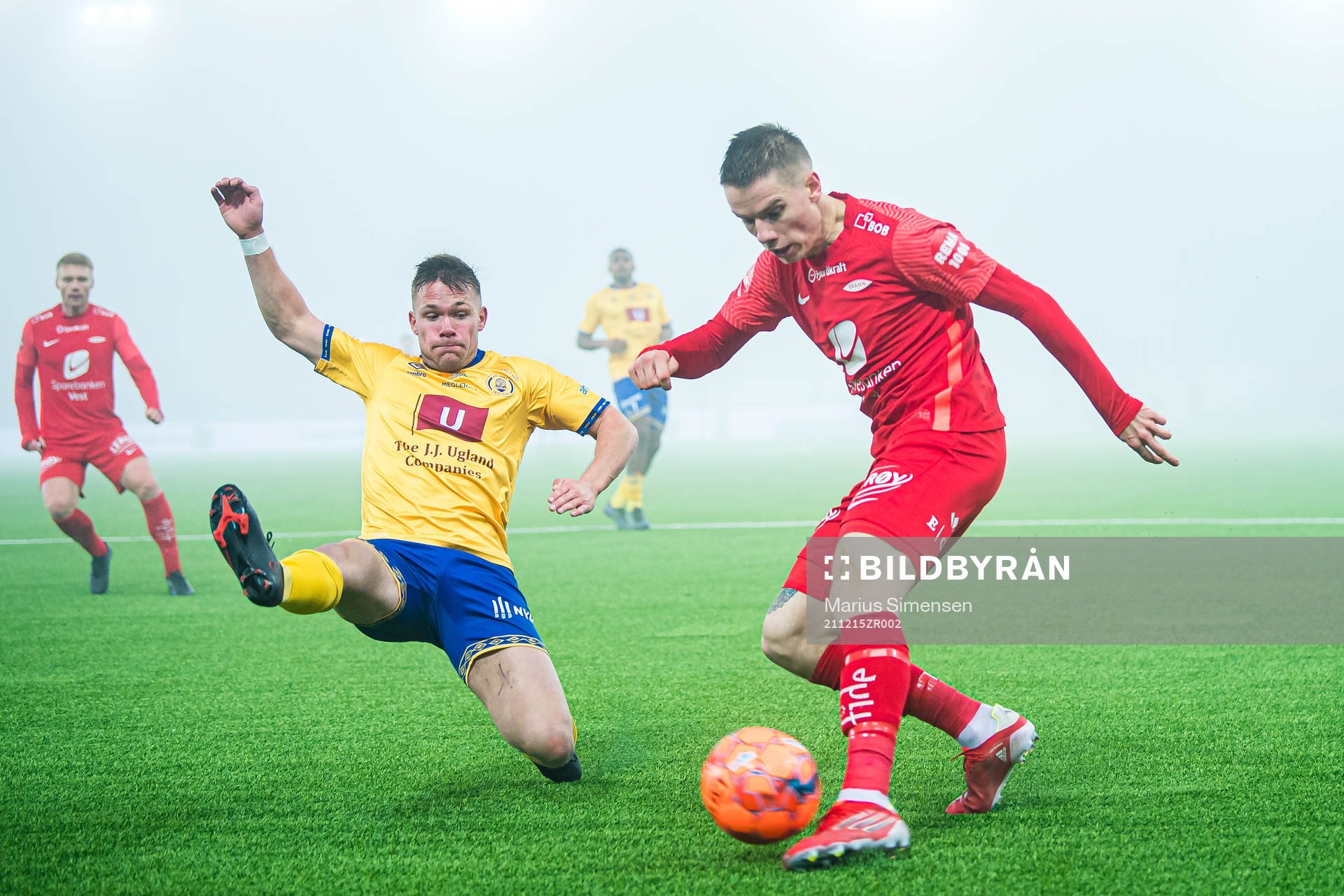 Torje Wichne of Jerv and Robert Thomas Taylor of Brann during the Eliteserien playoff football match between Brann and Jerv on December 15, 2021 in Oslo.