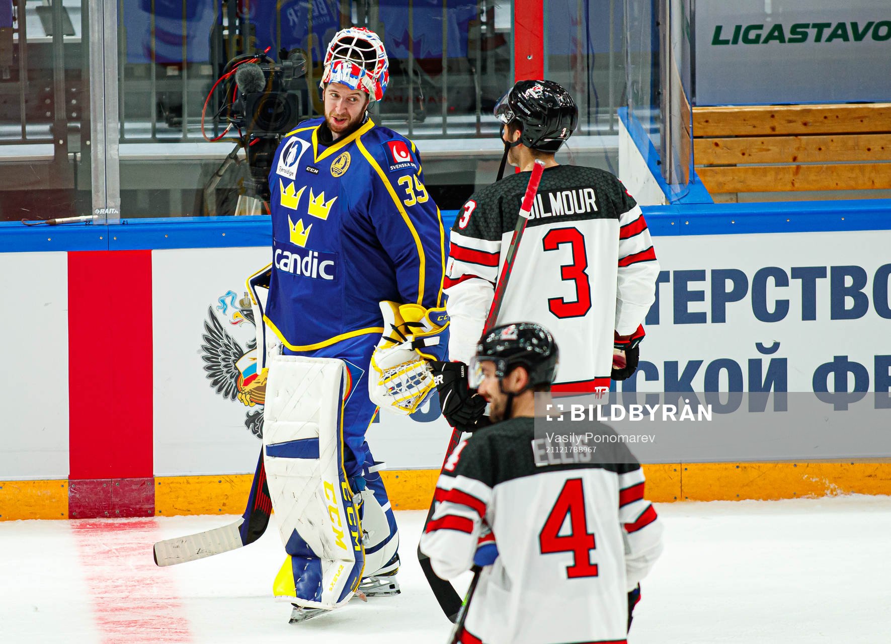 Goalkeeper Adam Reideborn of Sweden and C John Gilmore of