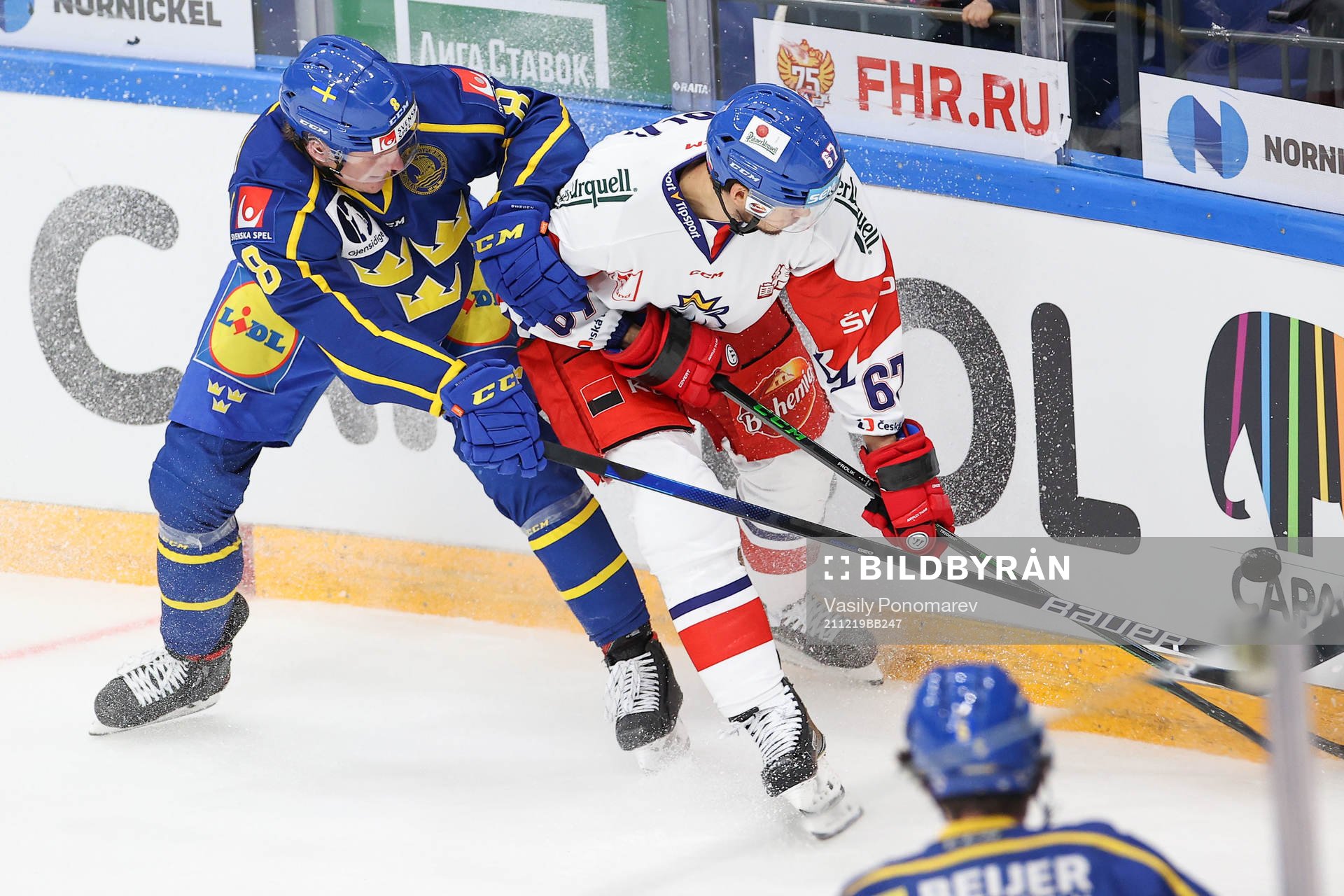 Fredrik Olofsson of Sweden and Michael Frolik of Czech