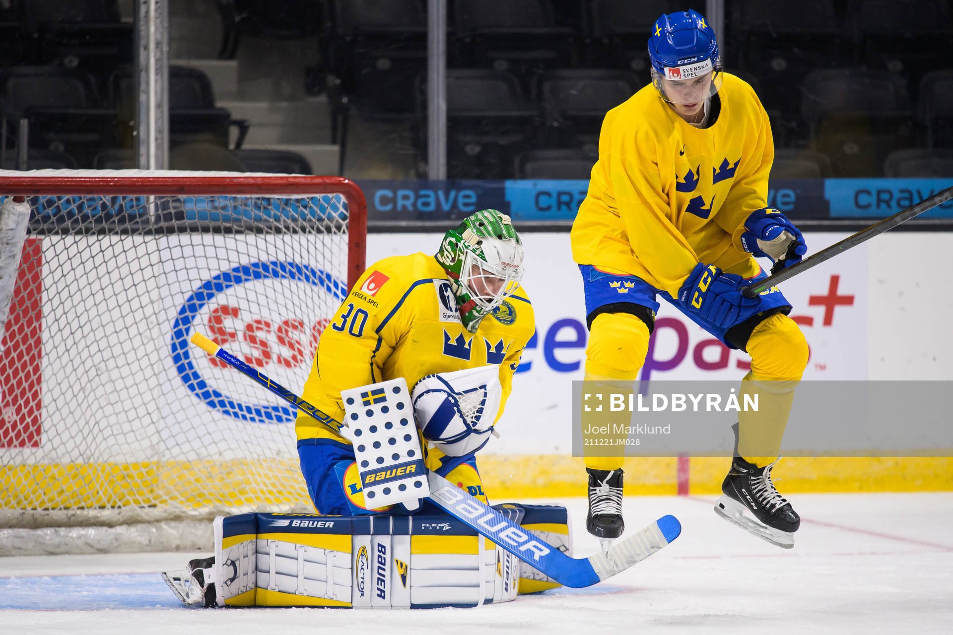 Goaltender Calle Clang and Elliot Ekmark of the Swedish