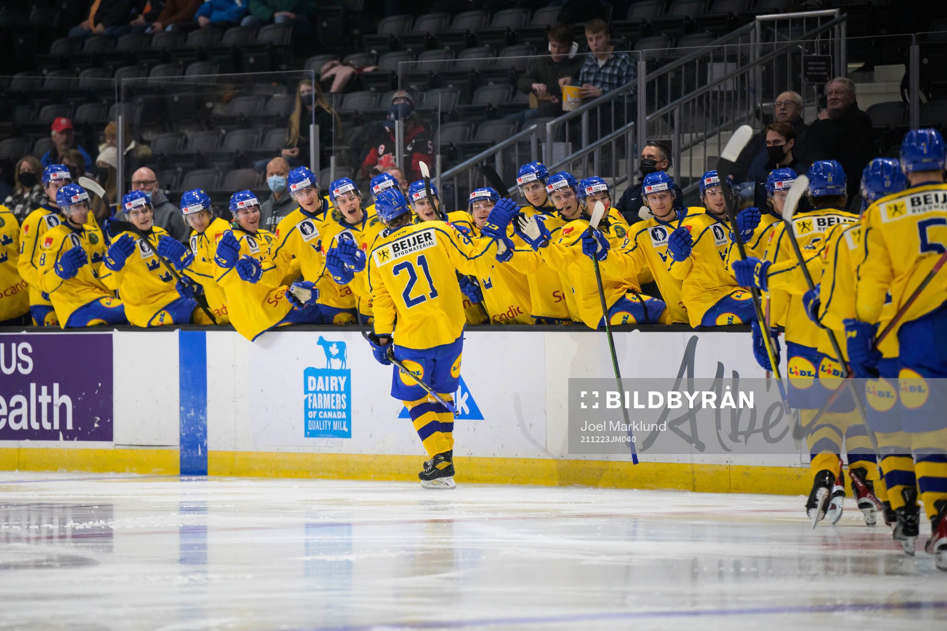 Oskar Olausson of Sweden celebrates with teammates