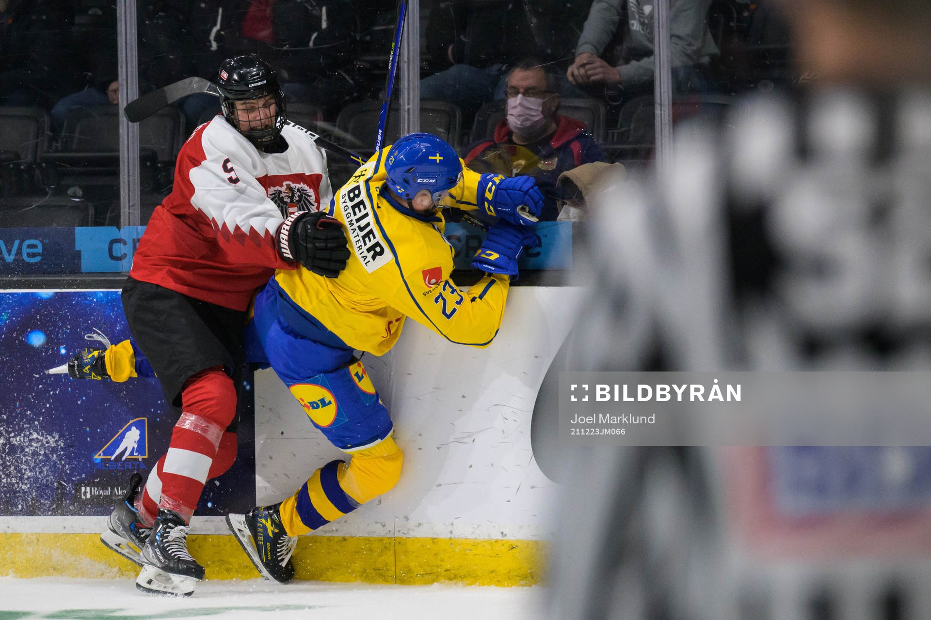 David Reinbacher of Austria tackles Isak Rosén of Sweden