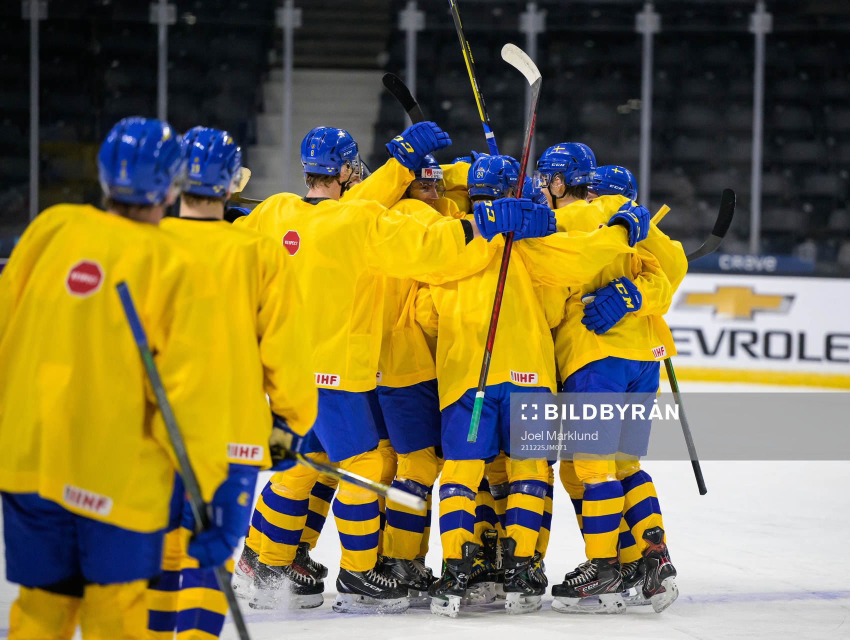 Players of Sweden celebrate at a training session