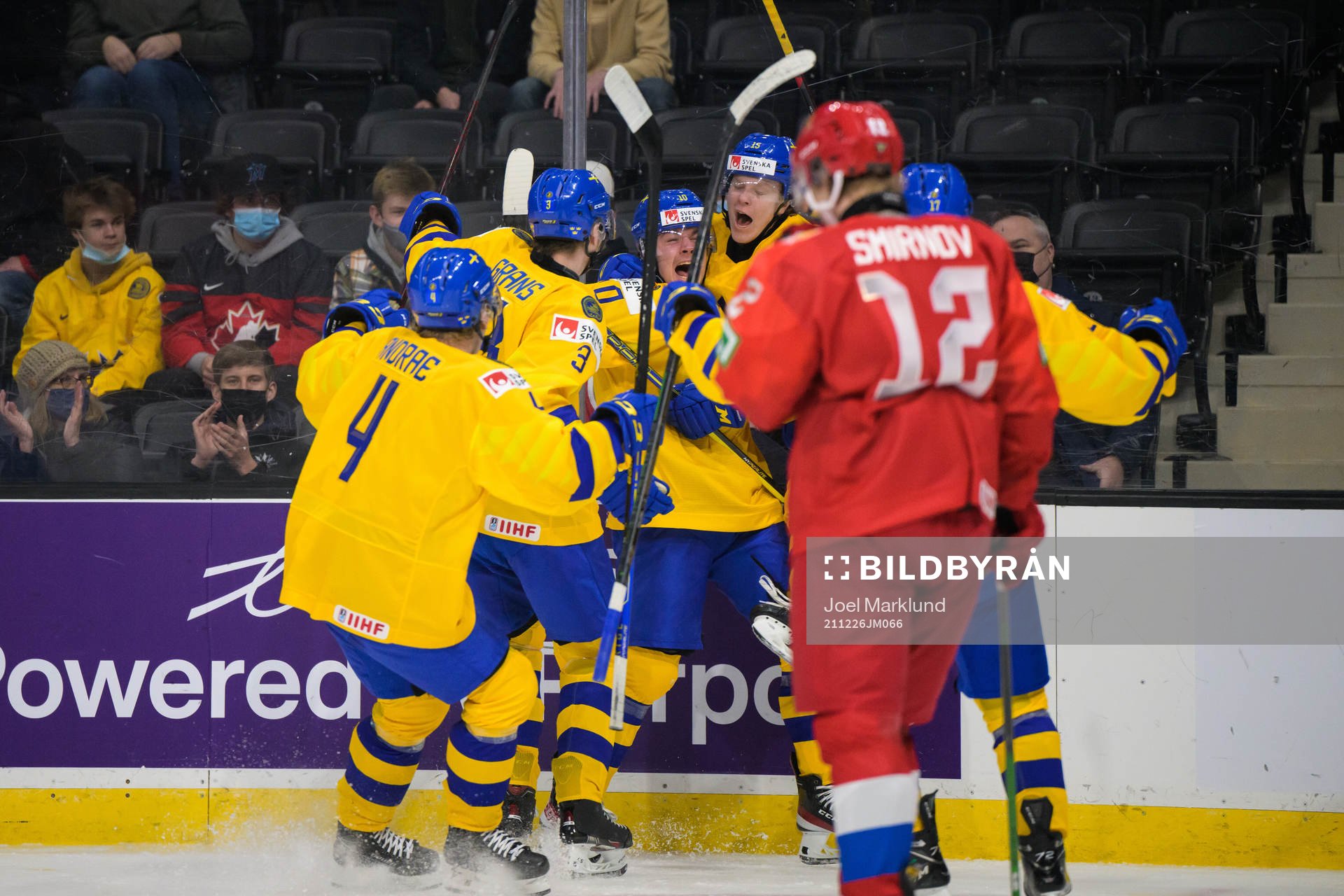 Alexander Holtz of Sweden celebrates with teammates