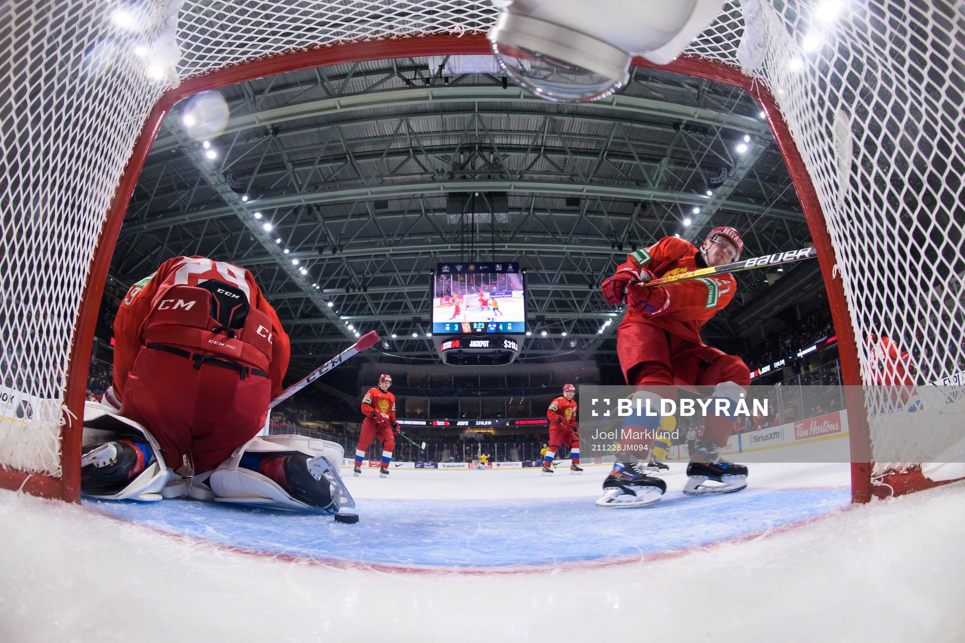 Nikita Guslistov of Russia smashes his stick