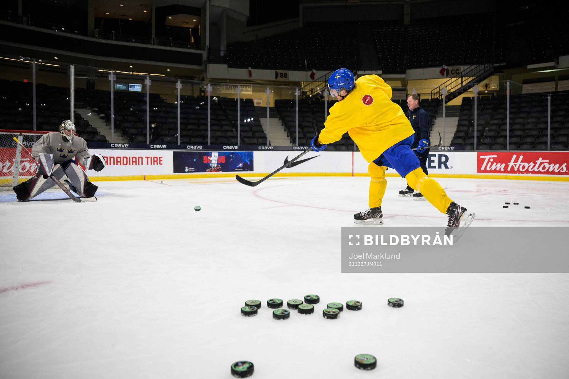 Goaltender Jesper Vikman and Måns Forsfjäll of Sweden at