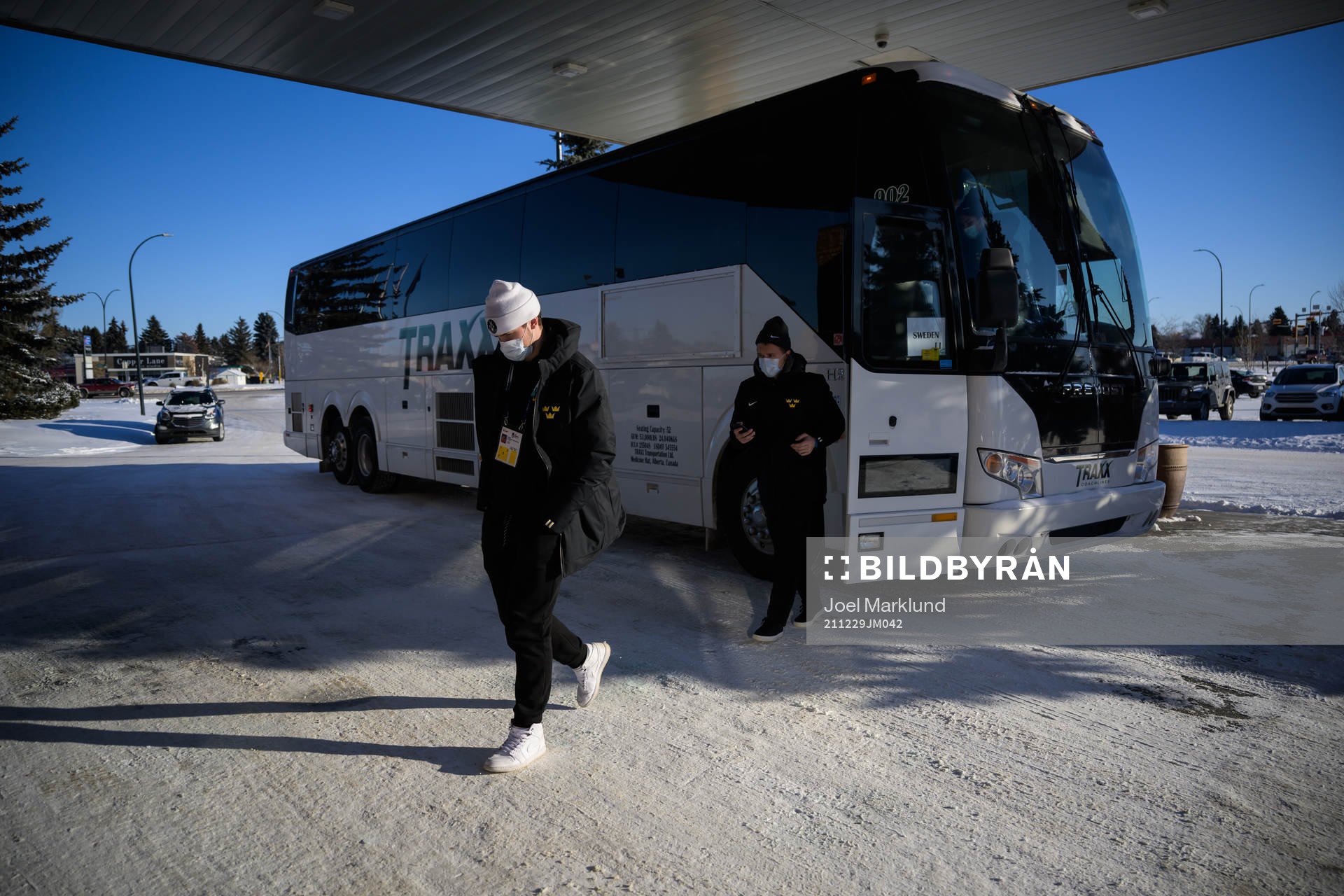 Goaltender Jesper Wallstedt of Sweden walks off the team bus
