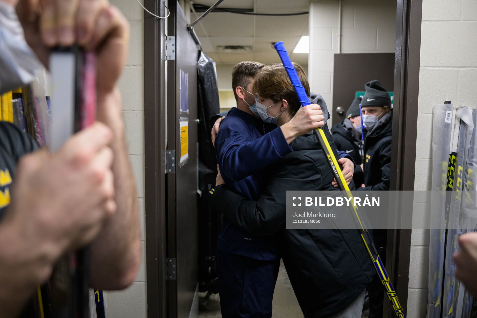 Doctor Ryan Allenby and Daniel Ljungman of Sweden hug each