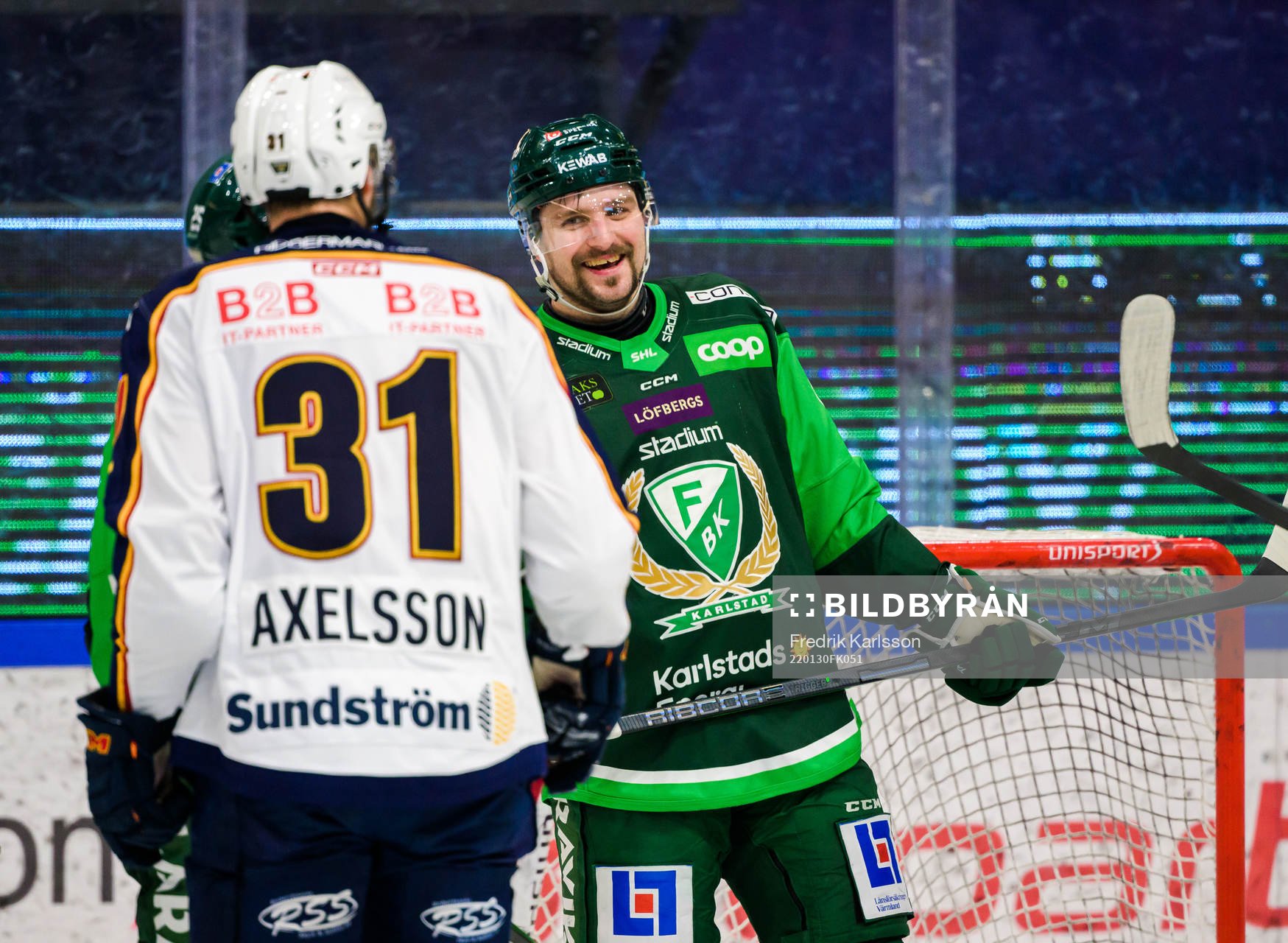 Djurgårdens Dick Axelsson och Färjestads Mikael Wikstrand