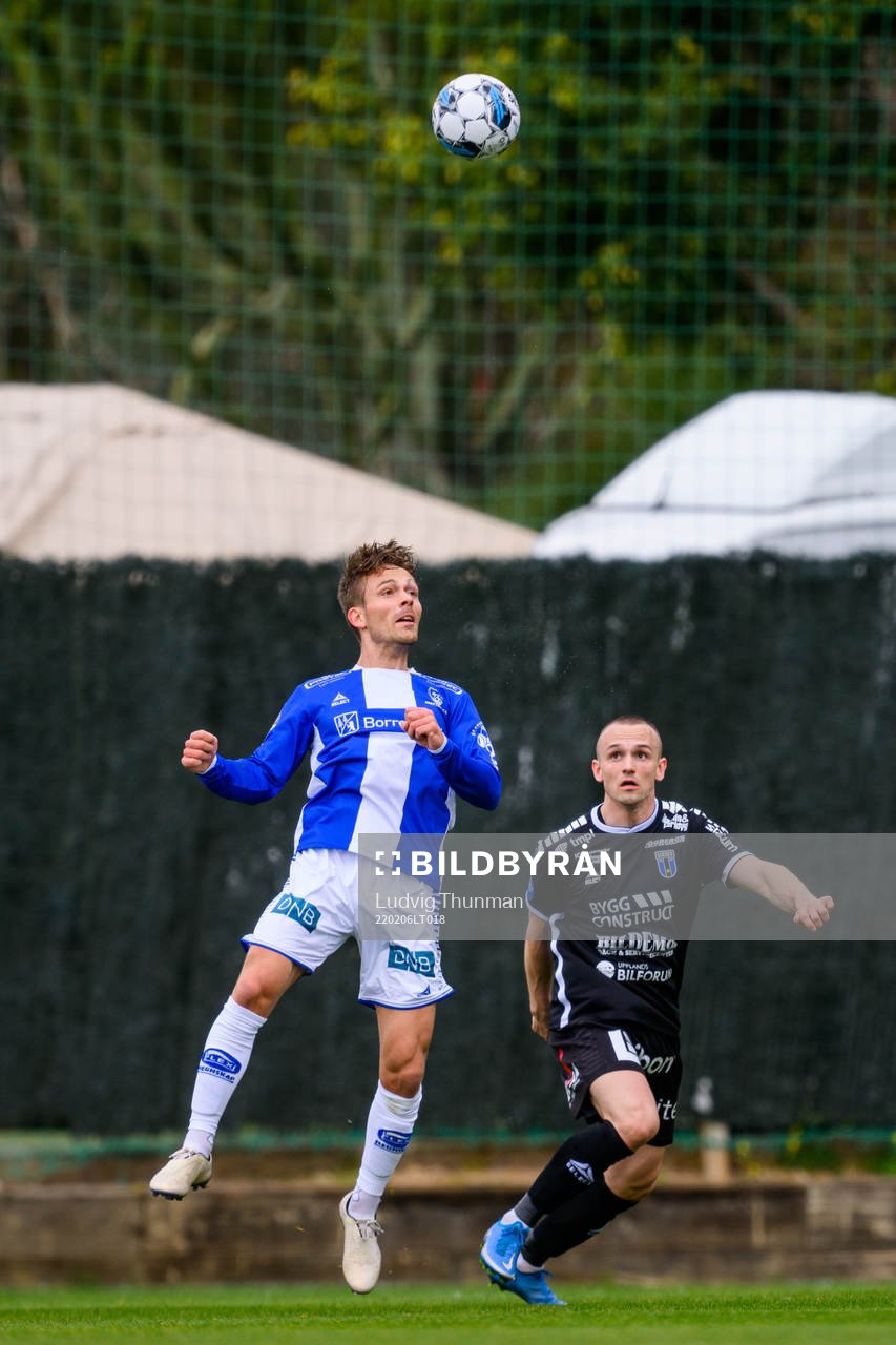 Mikkel Maigaard of Sarpsborg 08 and Aron Bjarnason of Sirius