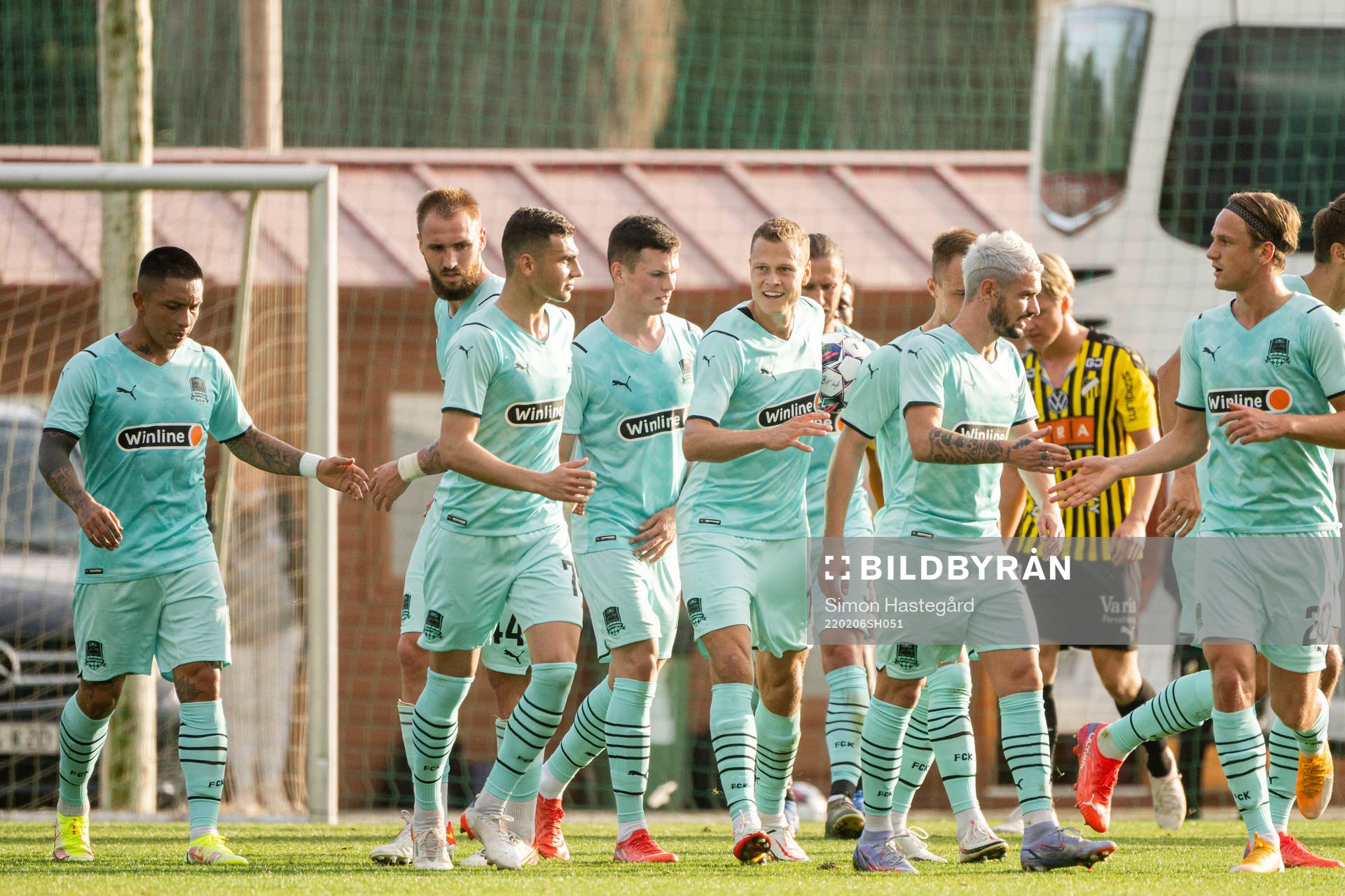 Eduard Spertsyan and Viktor Claesson of Krasnodar celebrate