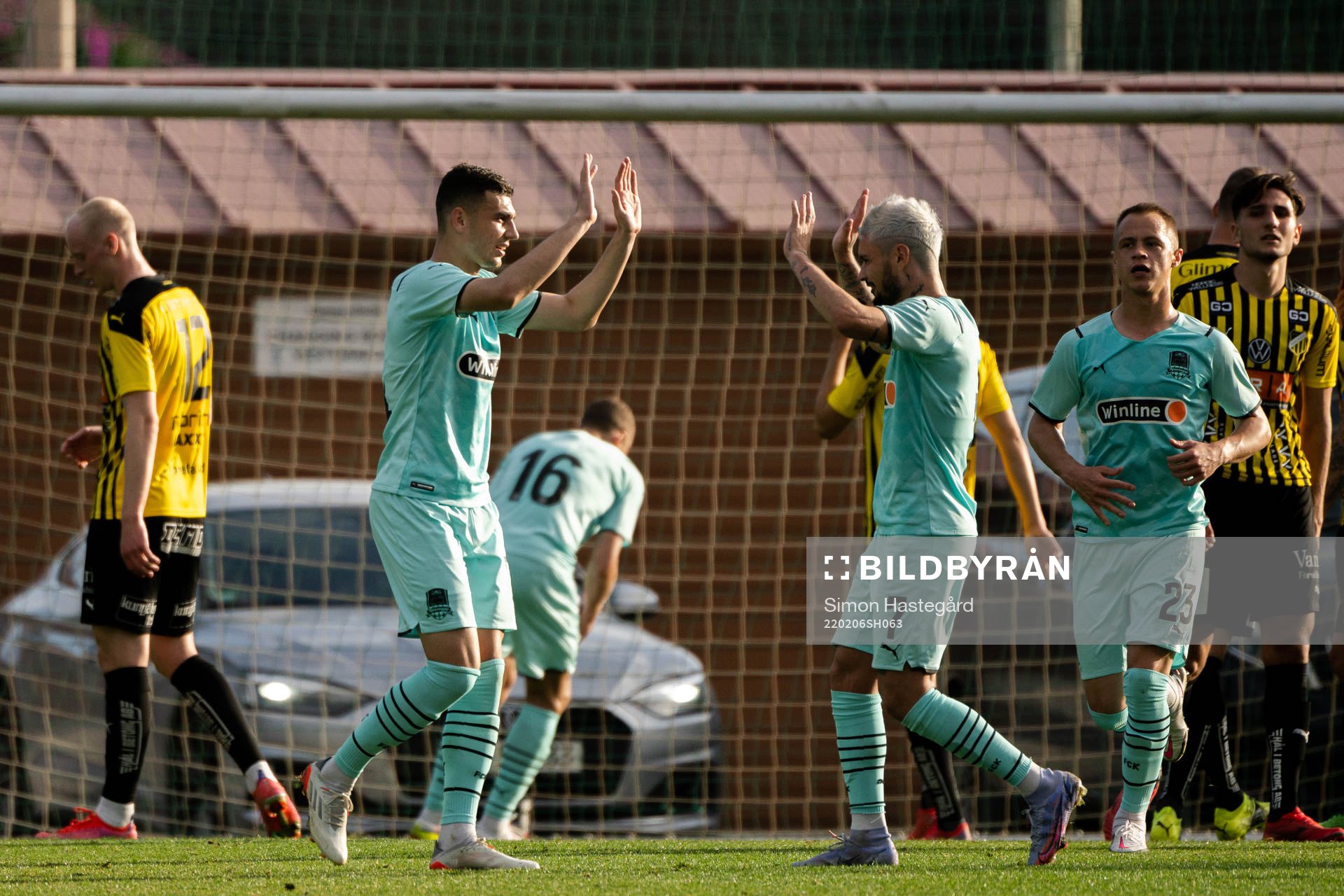 Eduard Spertsyan and Rémy Cabella of Krasnodar  celebrate