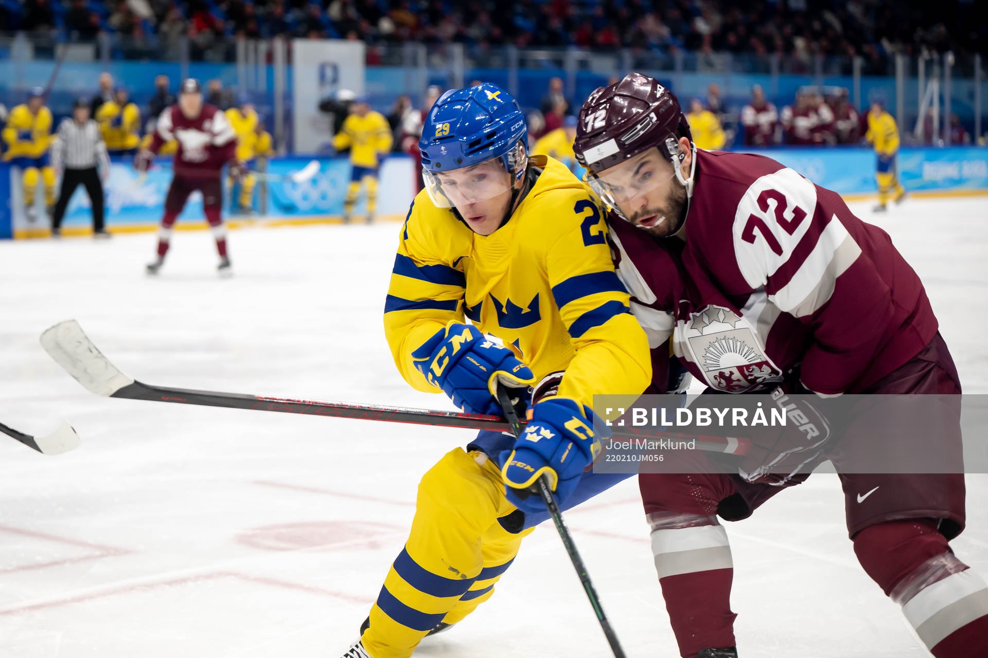 Lucas Wallmark of Sweden and Janis Jaks of Latvia in an ice