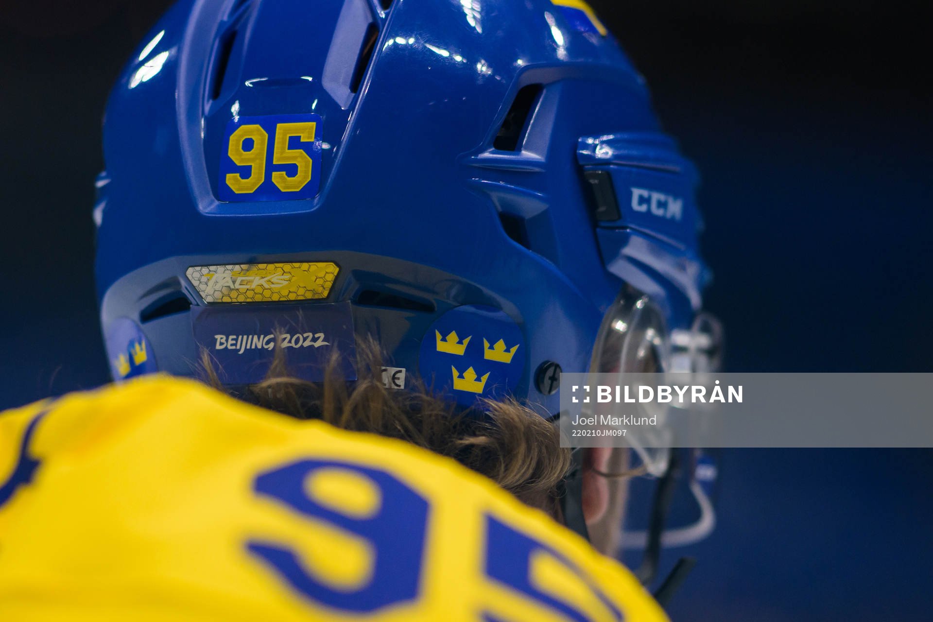 A Beijing 2022 sign at the helmet of Jacob de la Rose of